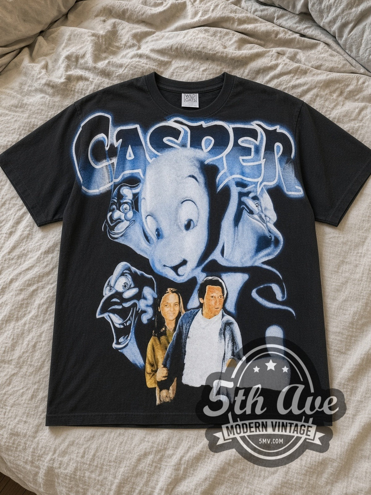 Black Casper AOP all over print Vintage Movie T-Shirt laid flat on a linen bed