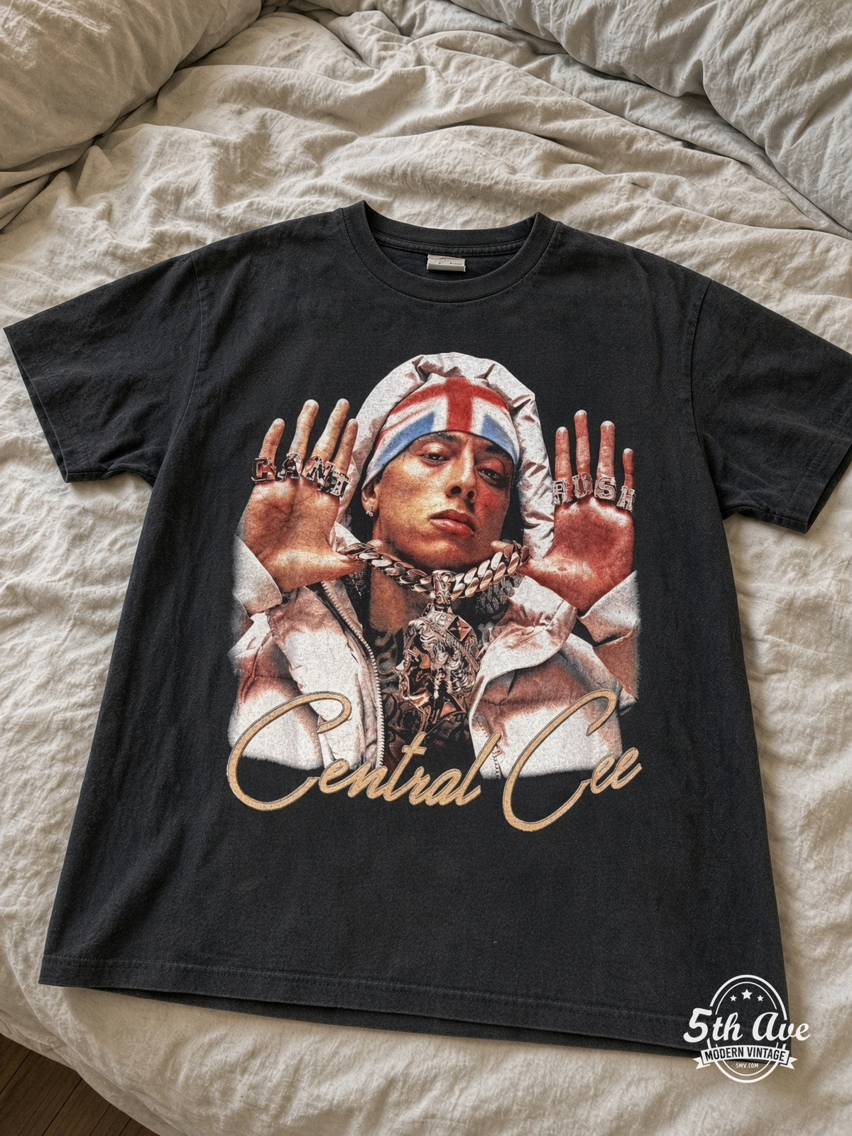 Central Cee Can't Rush Obsessed vintage tee laid on bed