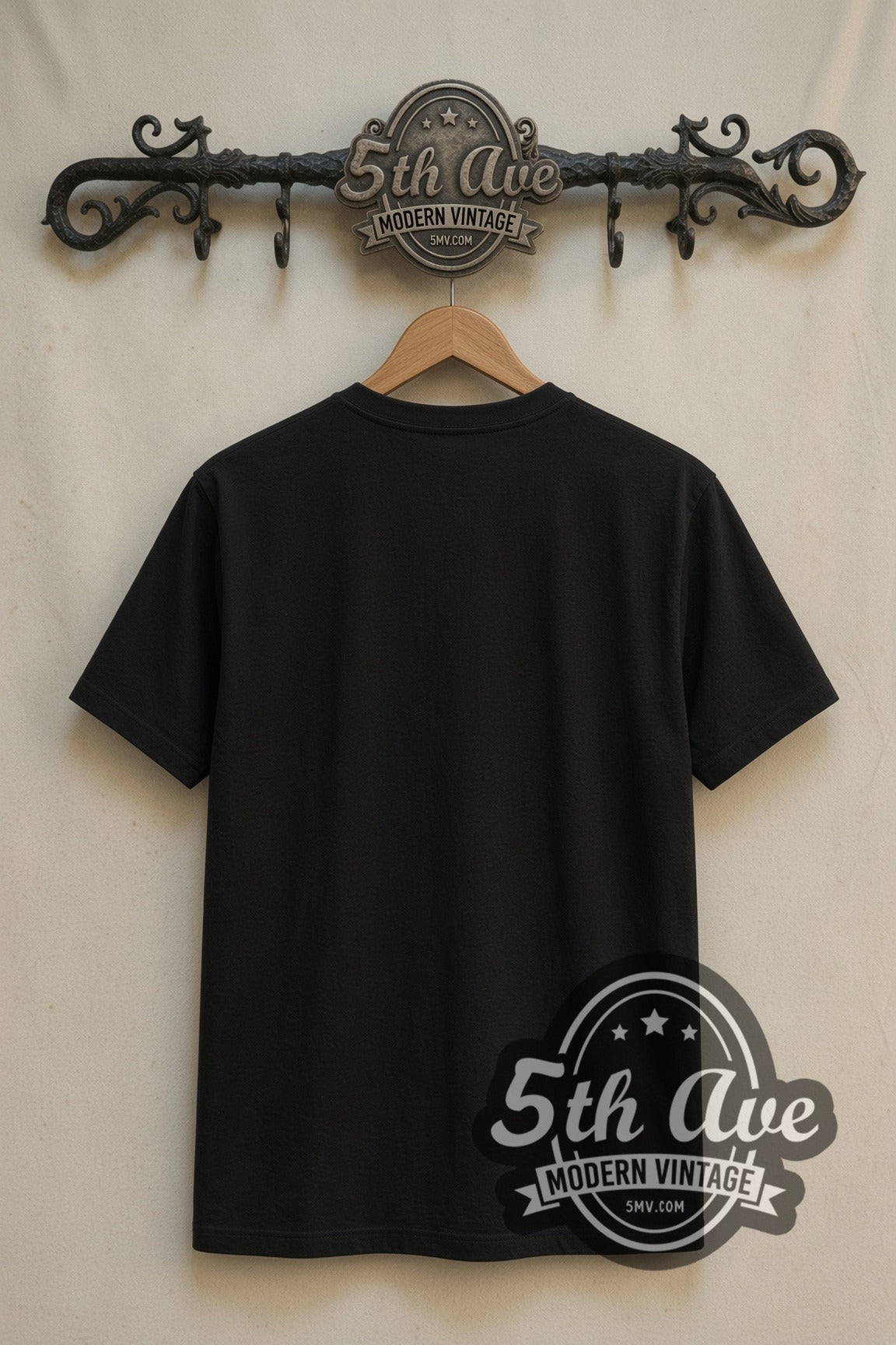 Plain black back of Child's Play Chucky Black Timber Game Over double stitched tee on rack