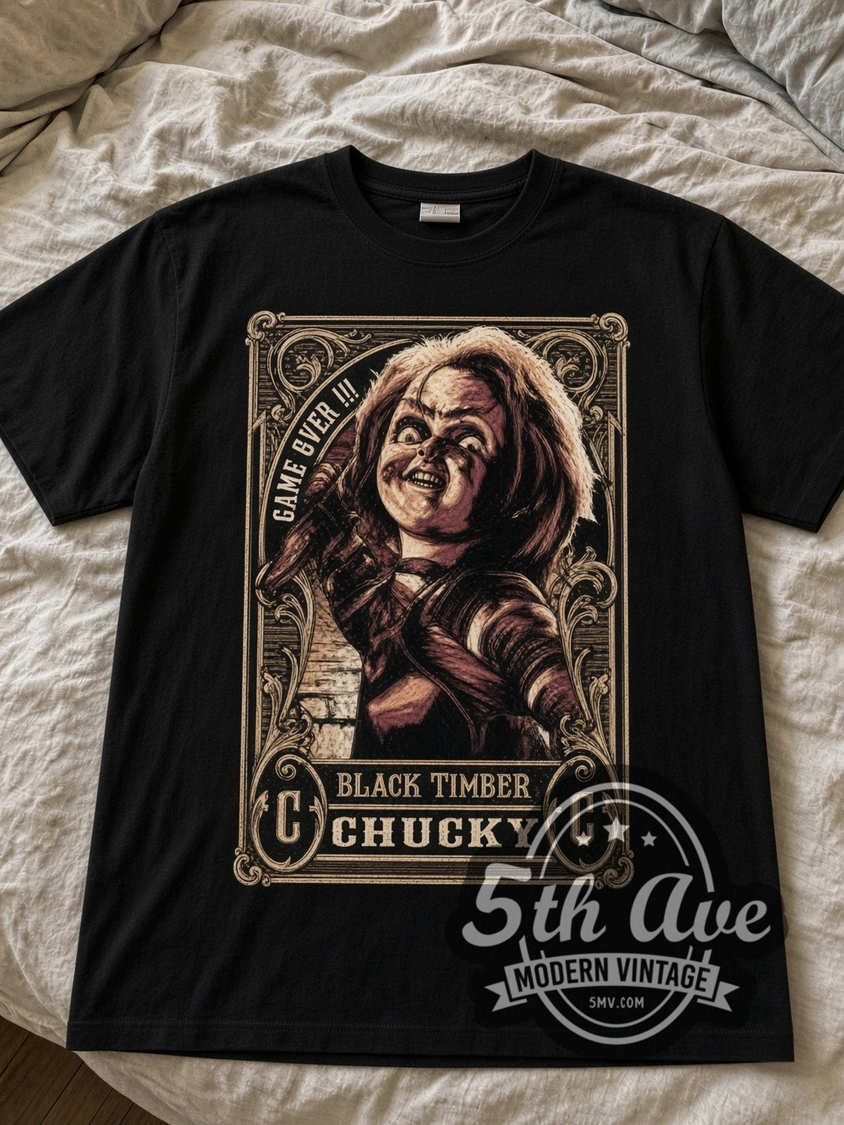 Child's Play Chucky Black Timber Game Over black graphic tee laid flat on linen bed