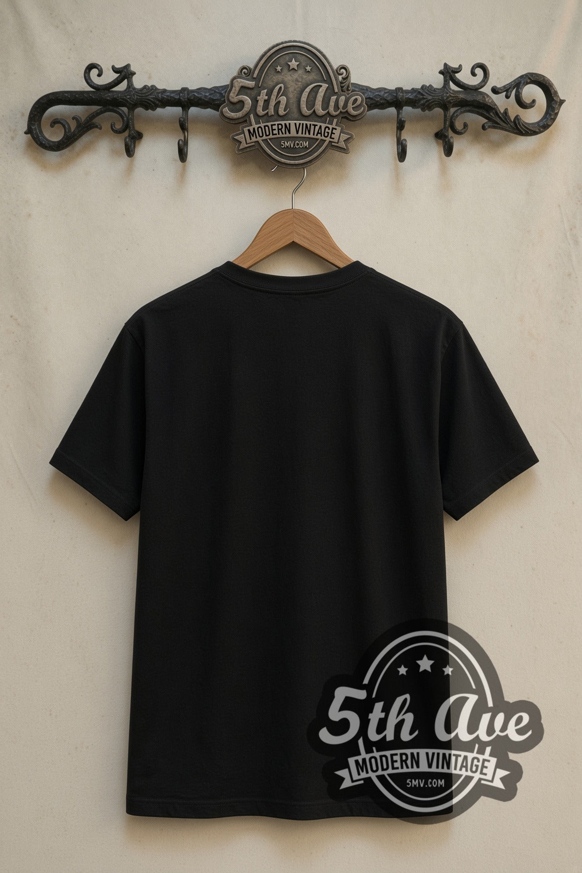 Plain black back of Child's Play Chucky Is Back double stitched tee on rack