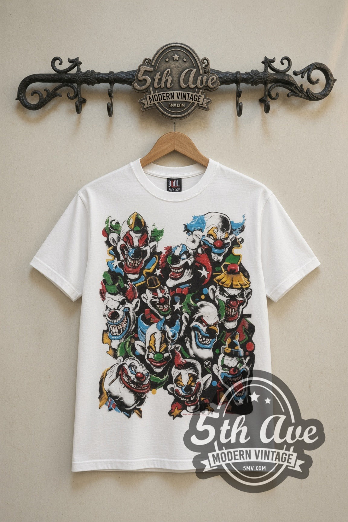 Clown Flash Many Faces cartoon tee in white, front view on a display rack