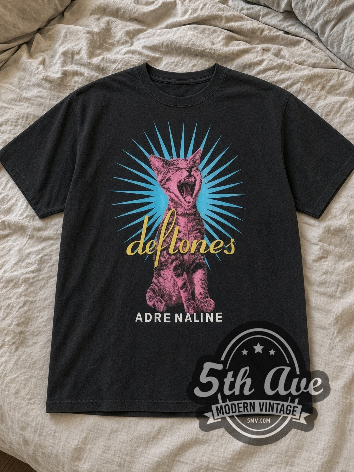 Black Deftones Adrenaline Vintage Band T-Shirt laid flat on a linen bed