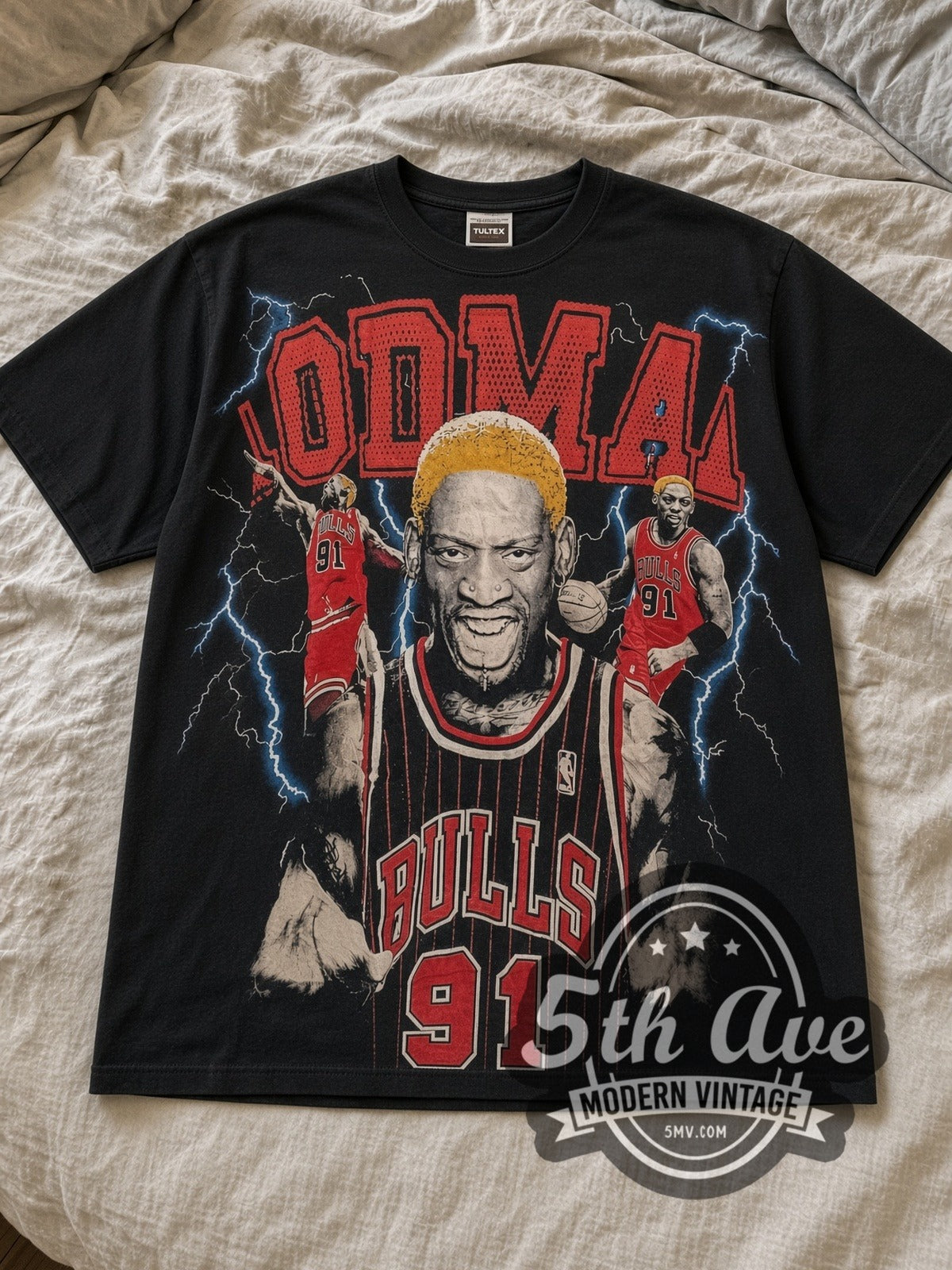 Black Dennis Rodman Chicago Bulls All Over Print Vintage Basketball T-Shirt laid flat on a linen bed