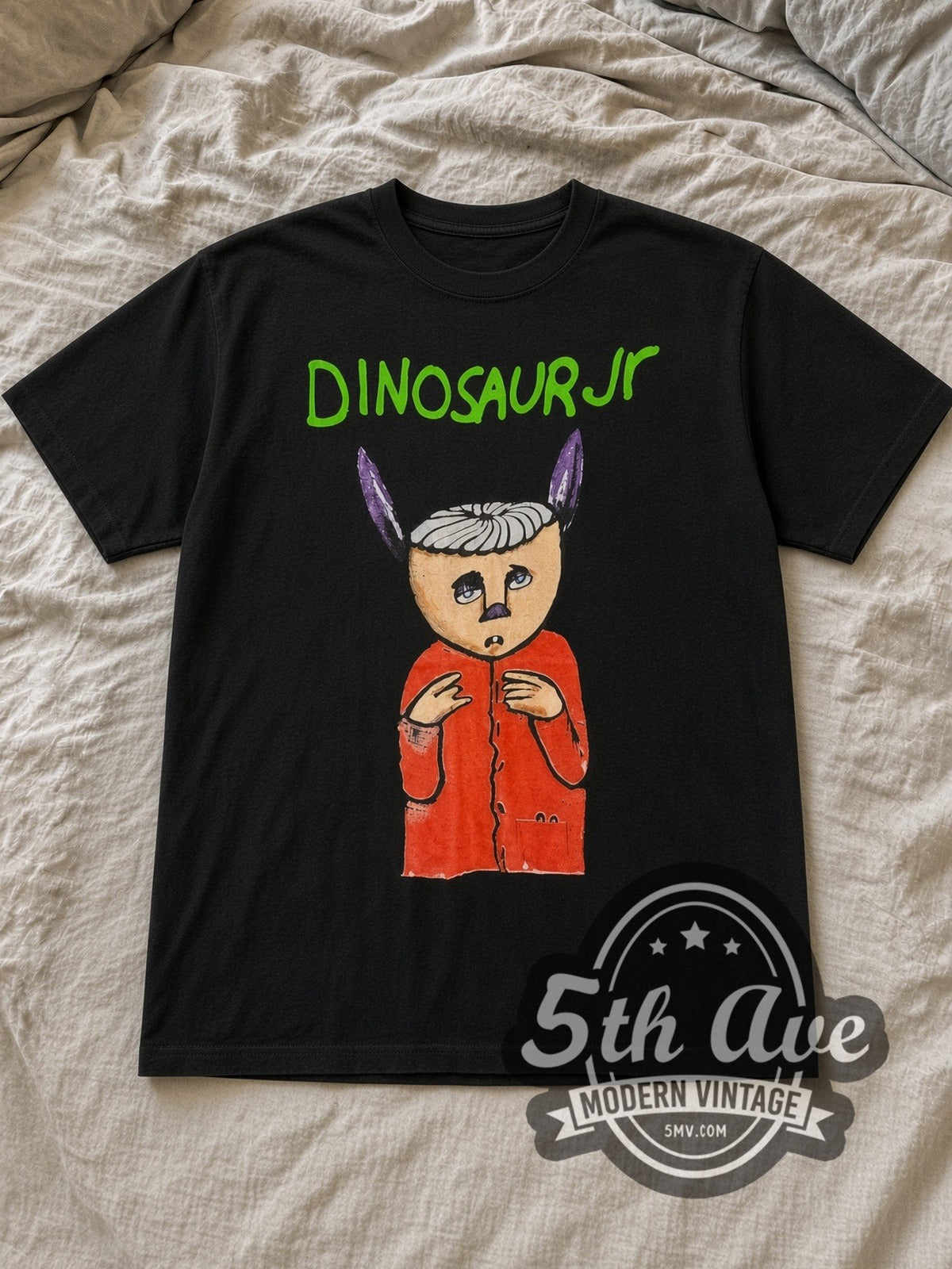 Black Dinosaur Jr. Without a Sound Vintage Band T-Shirt laid flat on a linen bed