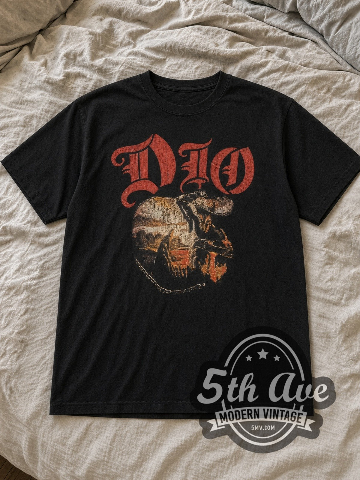 Black Dio Holy Diver Circular Murray Chain Vintage Band T-Shirt laid flat on a linen bed