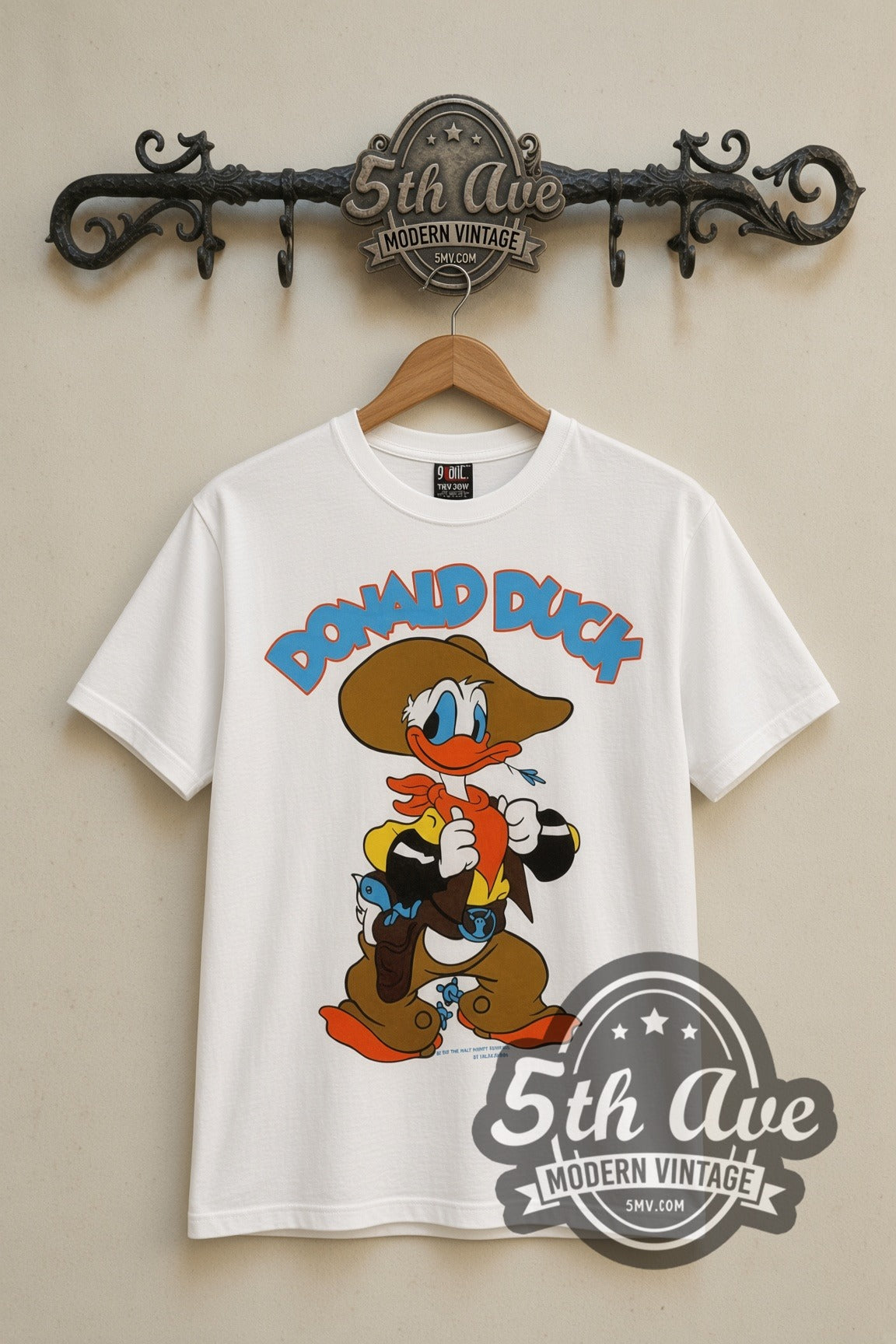 Disney Donald Duck Cowboy and DuckTales Scrooge cartoon tee in white, front view on a display rack