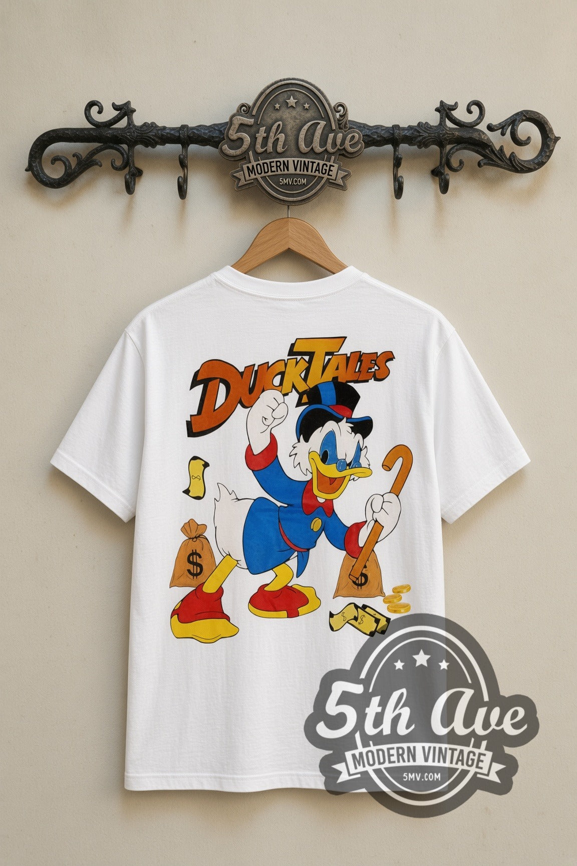 Disney Donald Duck Cowboy and DuckTales Scrooge cartoon tee in white, back view on a display rack