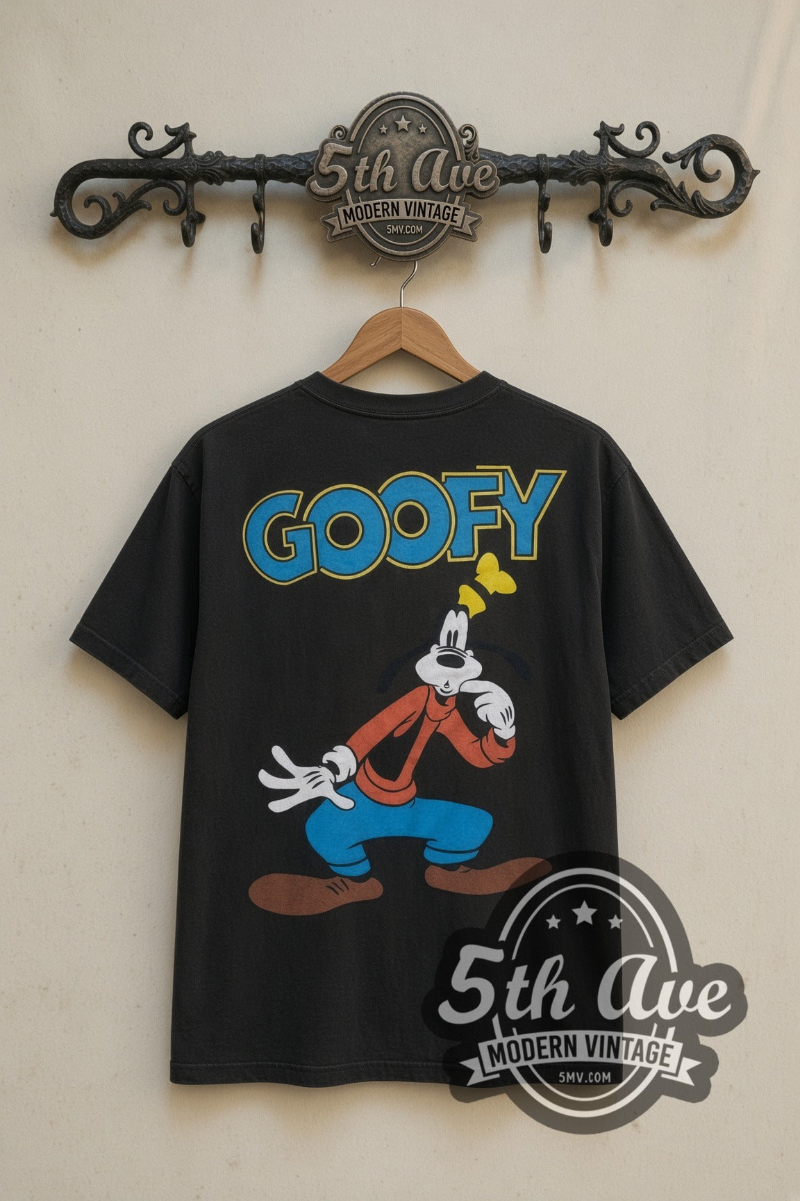 Disney Goofy Goofin Around cartoon tee in black, back view on a display rack