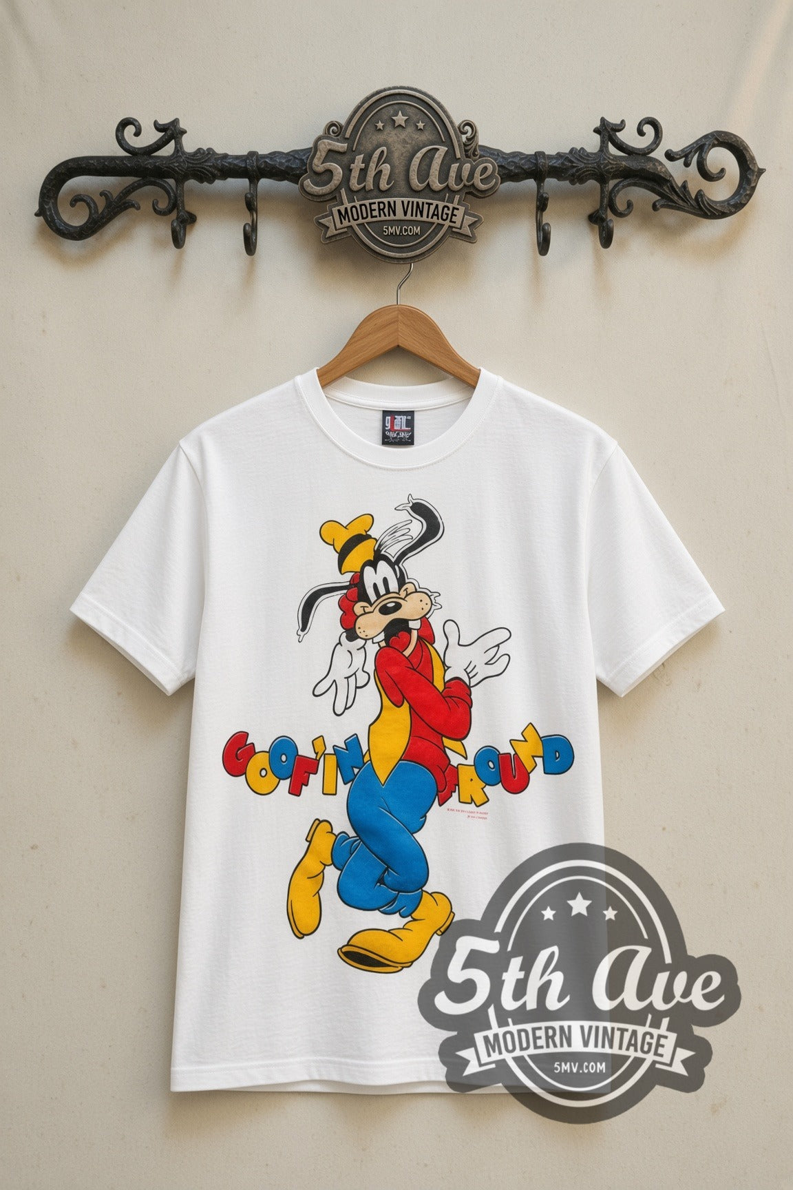 Disney Goofy Goofin Around cartoon tee in white, front view on a display rack
