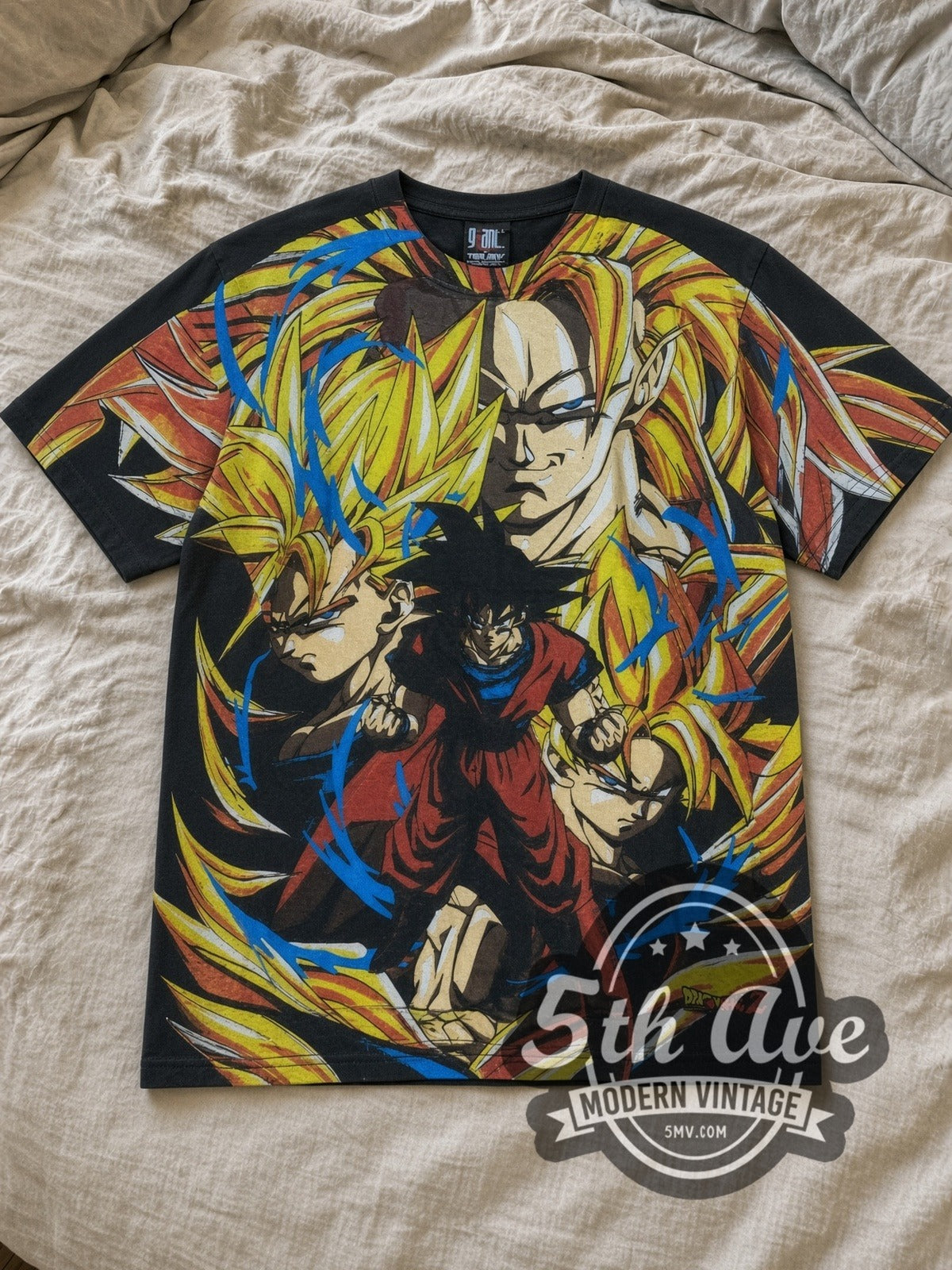 Black Dragon Ball Z Goku Super Saiyan All Over Print Vintage Anime T-Shirt laid flat on a linen bed
