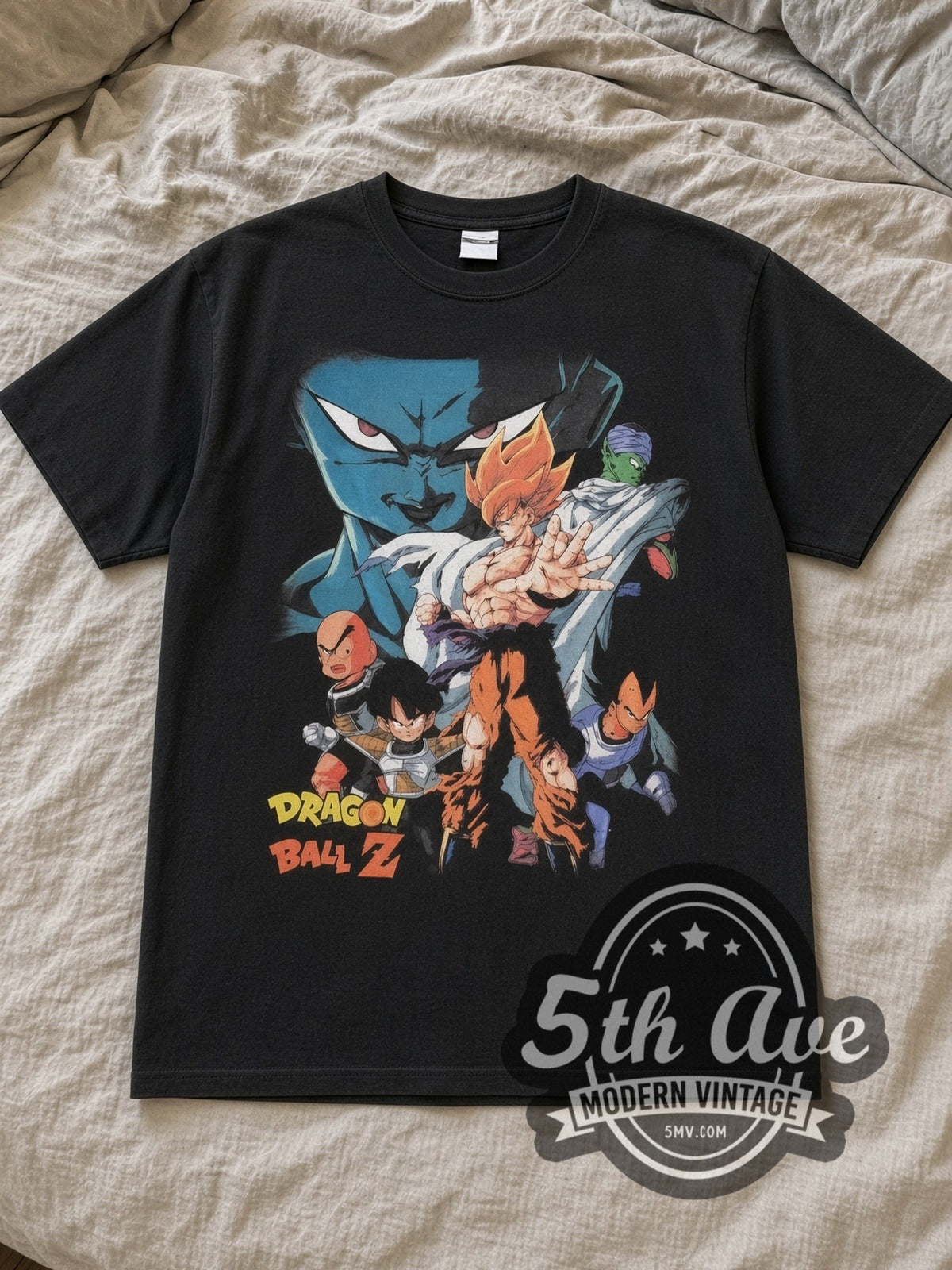 Black Dragon Ball Z Super Saiyan Characters Vintage Anime T-Shirt laid flat on a linen bed