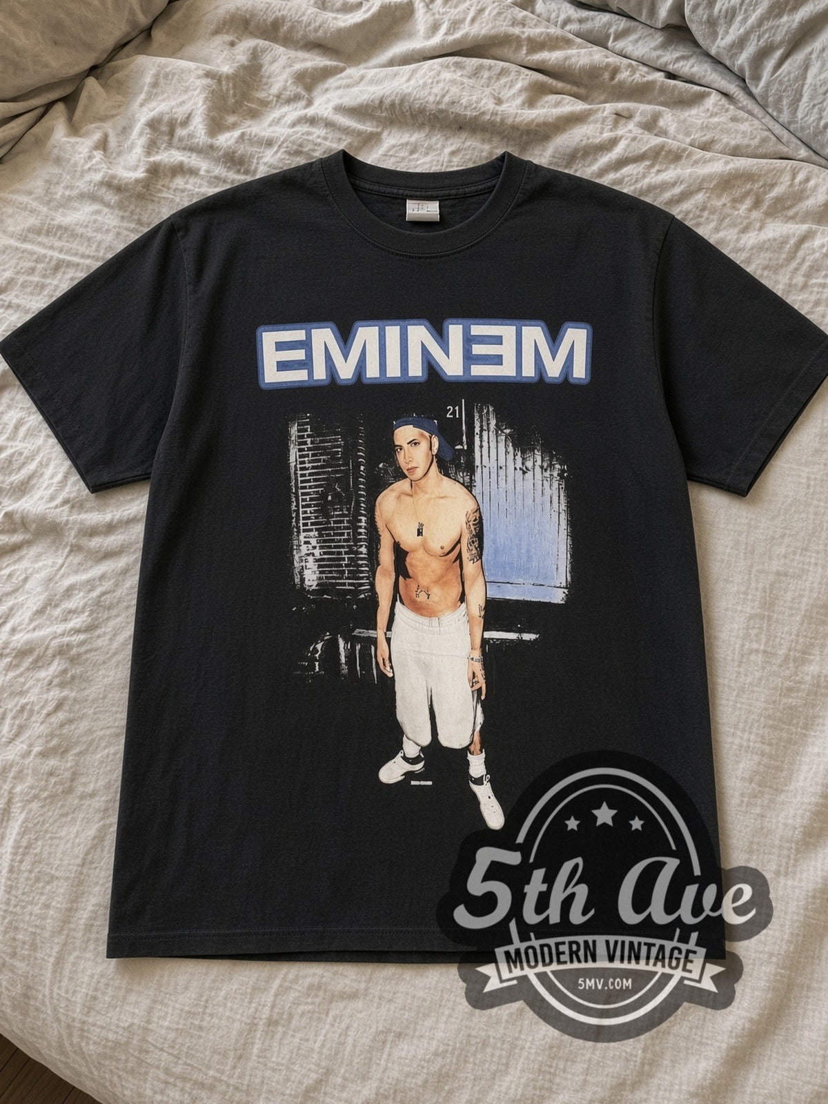 Black Eminem Pinhead EMINƎM Vintage Rap Tee laid flat on a linen bed