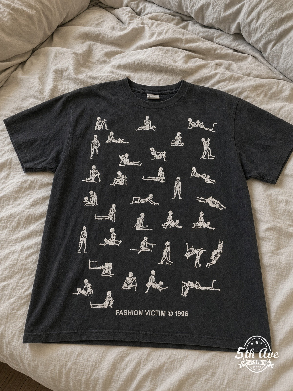 Fashion Victim Skeleton Kama Sutra 1996 vintage tee laid on bed