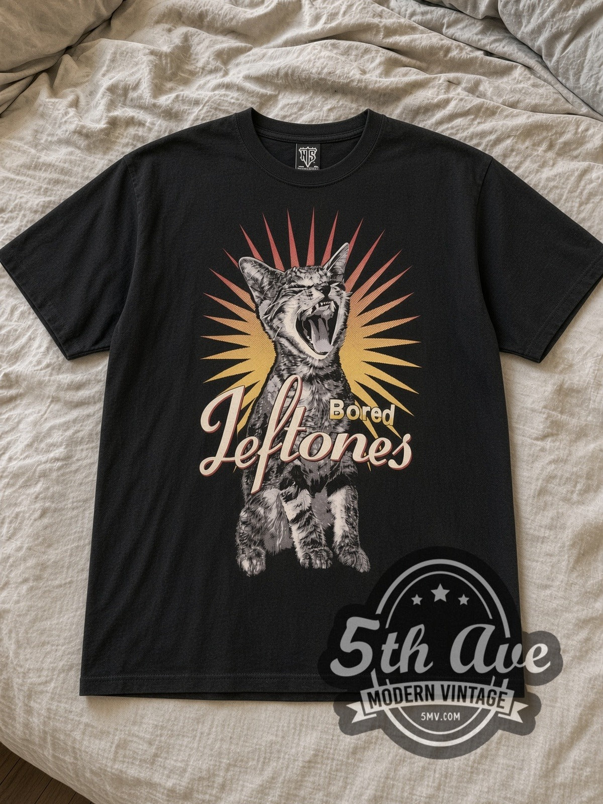 Black Deftones Feeling Bored Vintage Band T-Shirt laid flat on a linen bed