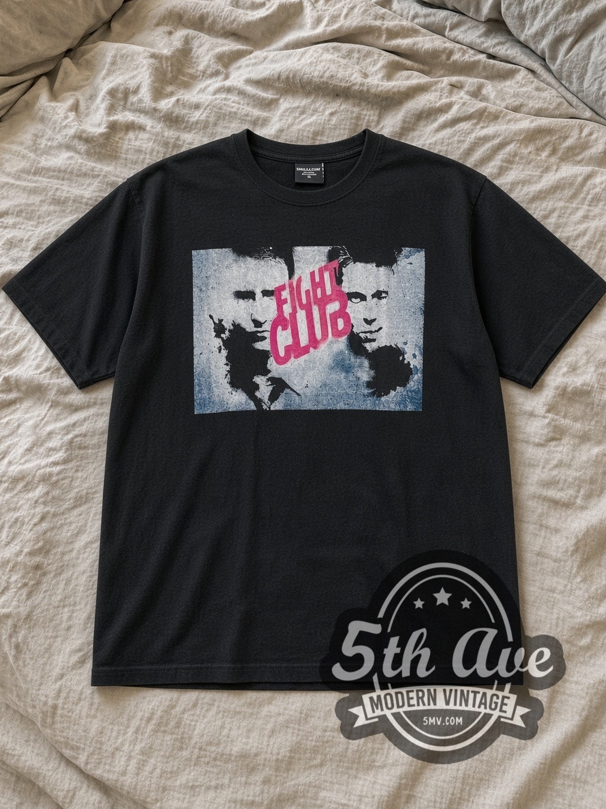 Black Fight Club Vintage Movie T-Shirt laid flat on a linen bed