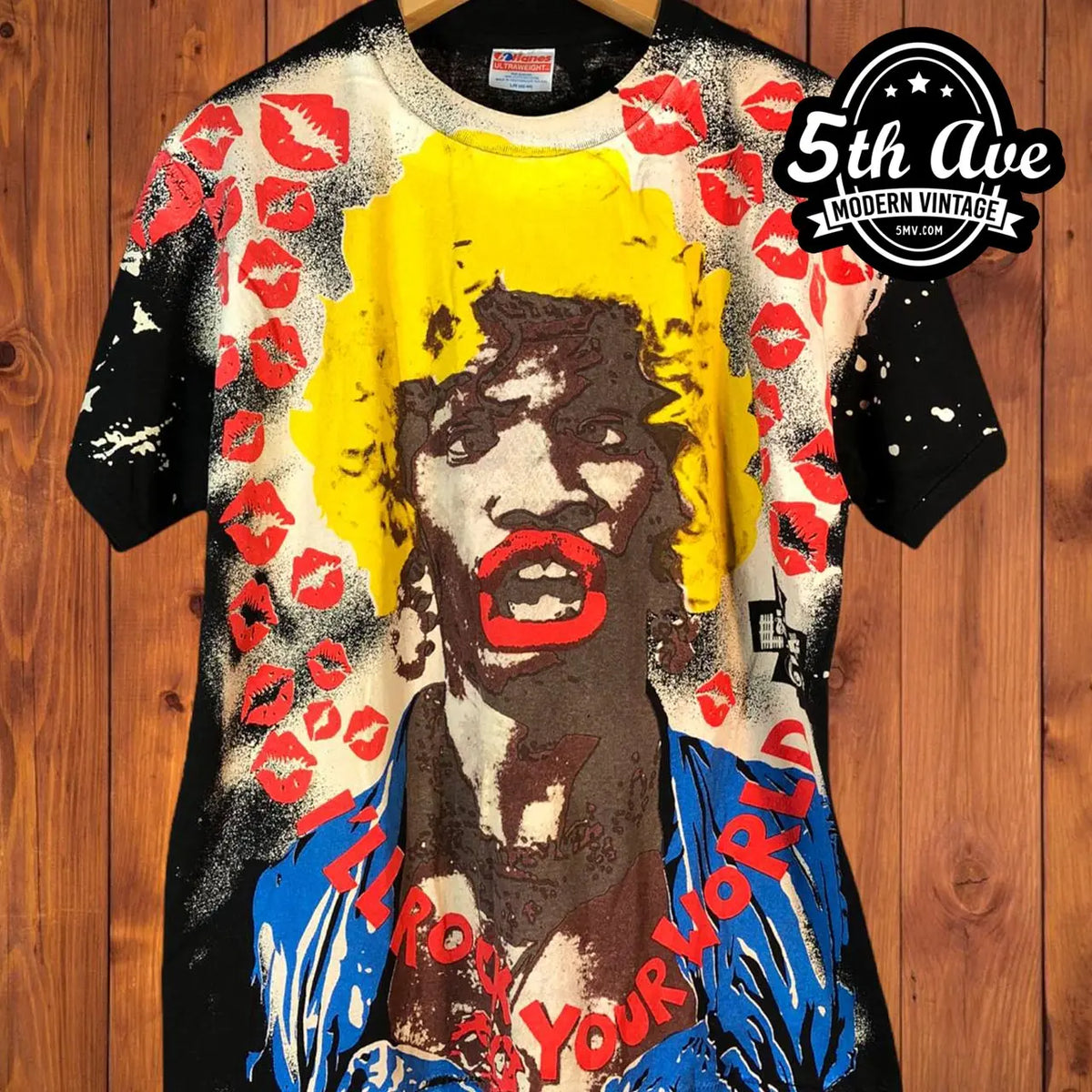 In Living Color – Mosquitohead – Vintage Movie Tee vintage t-shirt laid on bed