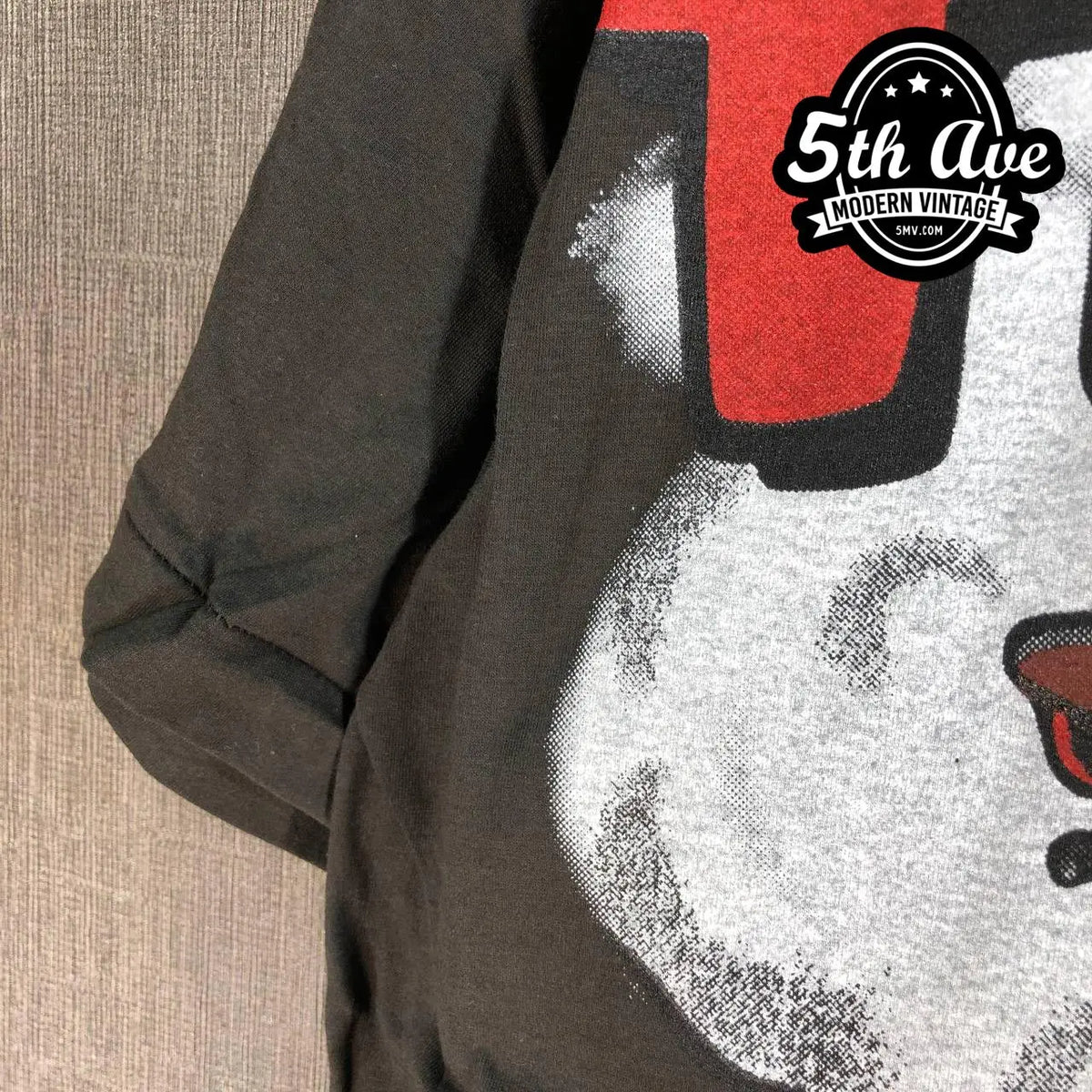 Model wearing Looney Tunes Taz-Mania Fast Track - AOP all over print New Vintage Animation T-Shirt vintage band tee