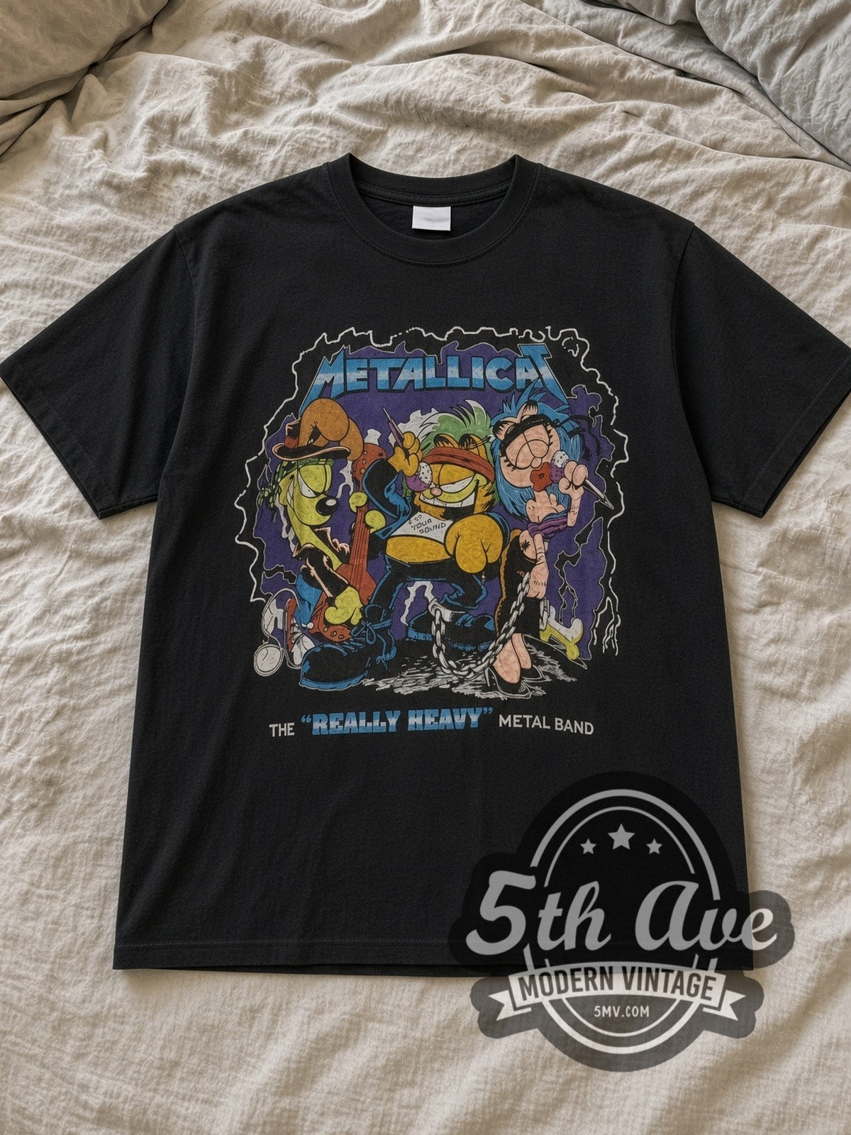 Black Metallica x Garfield Metallicat Vintage Band T-Shirt laid flat on a linen bed