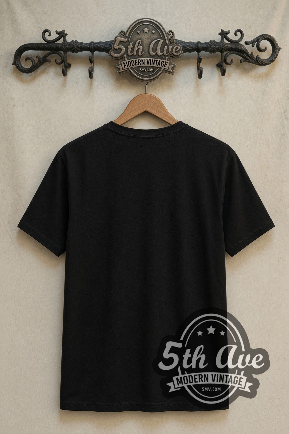 Plain black back of God of War Kratos double stitched tee on rack