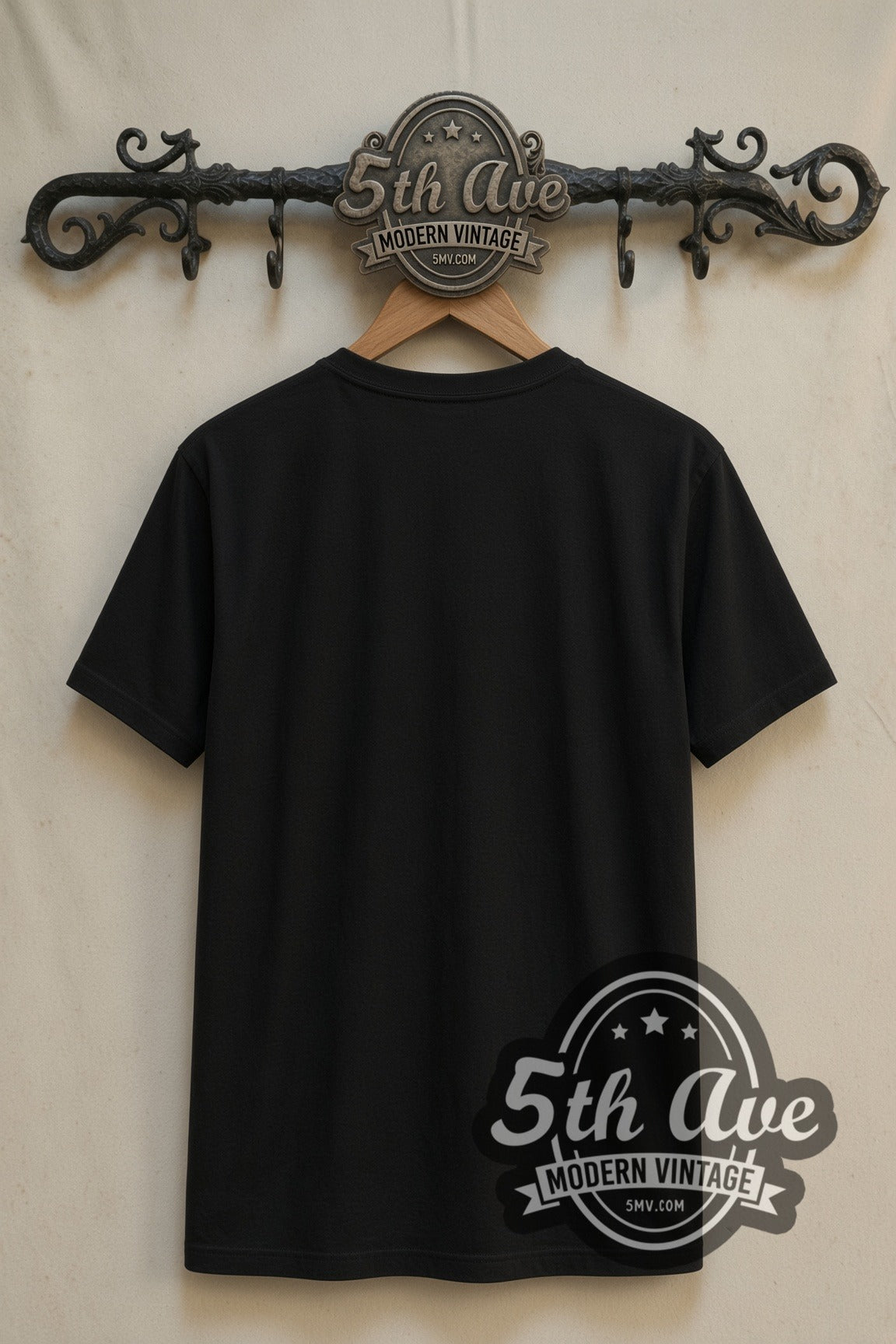 Plain black back of Godzilla x Kong The New Empire double stitched tee on rack
