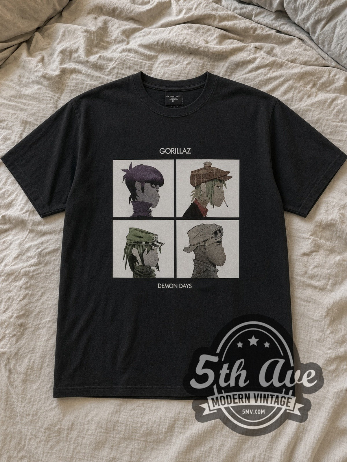 Black Gorillaz Demon Days Four Panel Portraits Vintage Band T-Shirt laid flat on a linen bed