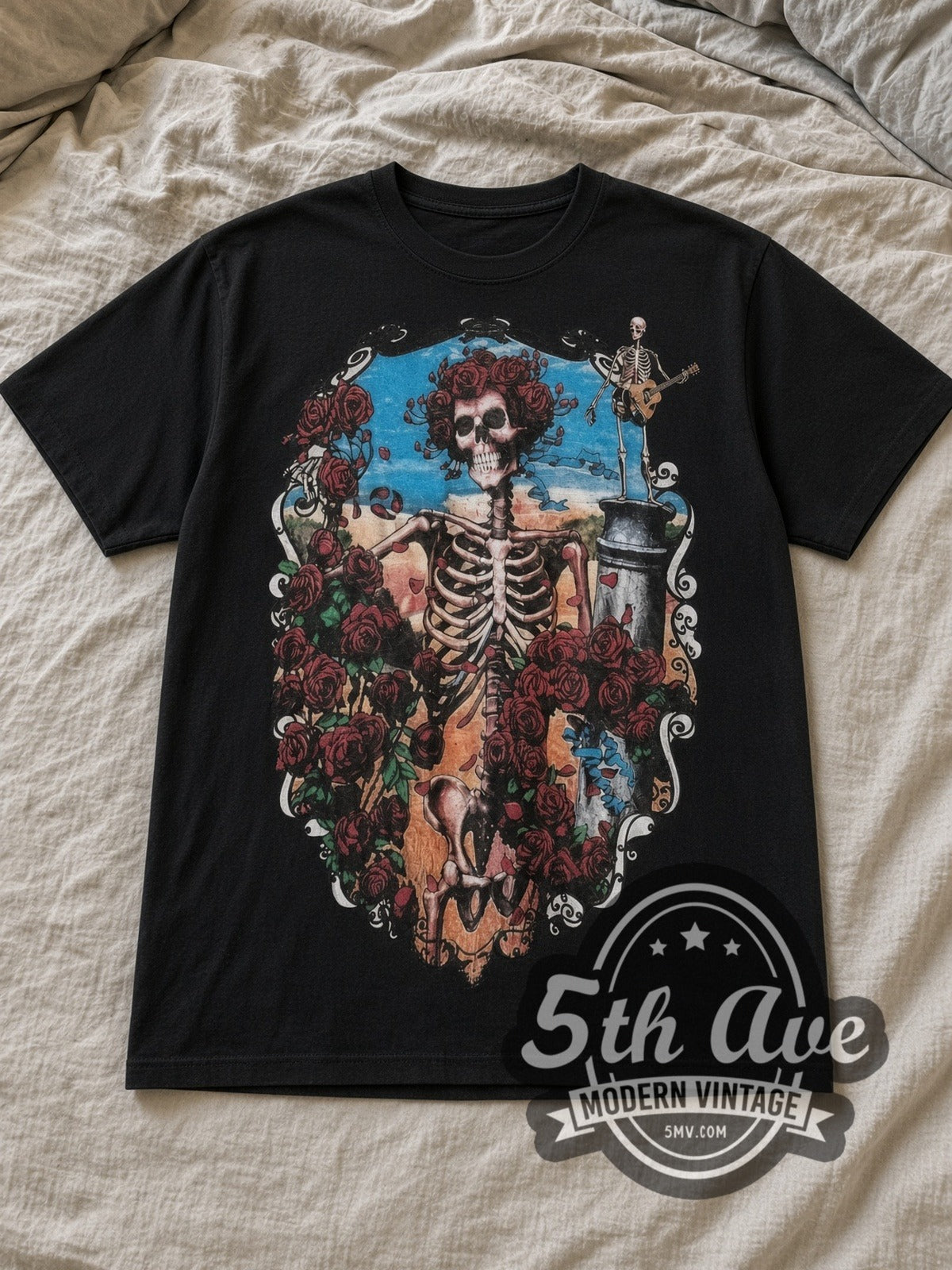 Black Grateful Dead 30 Year Tribute Vintage Band T-Shirt laid flat on a linen bed