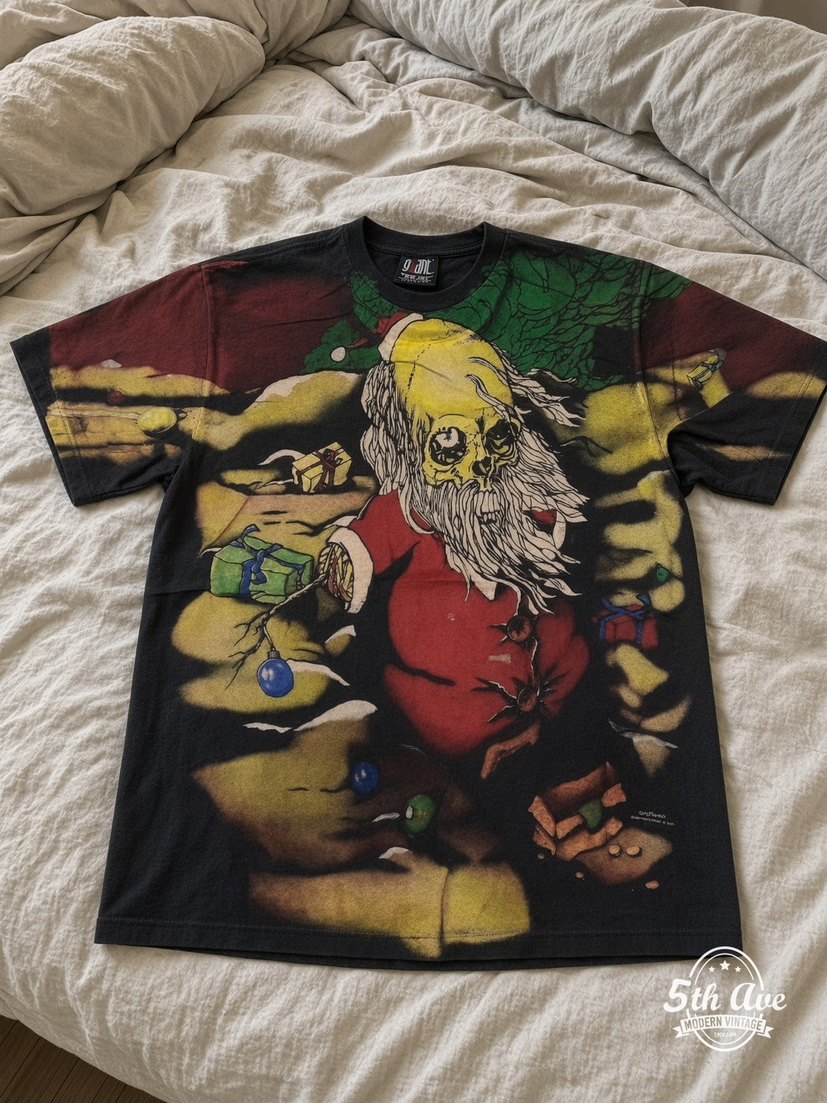 Grateful Dead Psychedelic Santa all over print vintage tee laid on bed