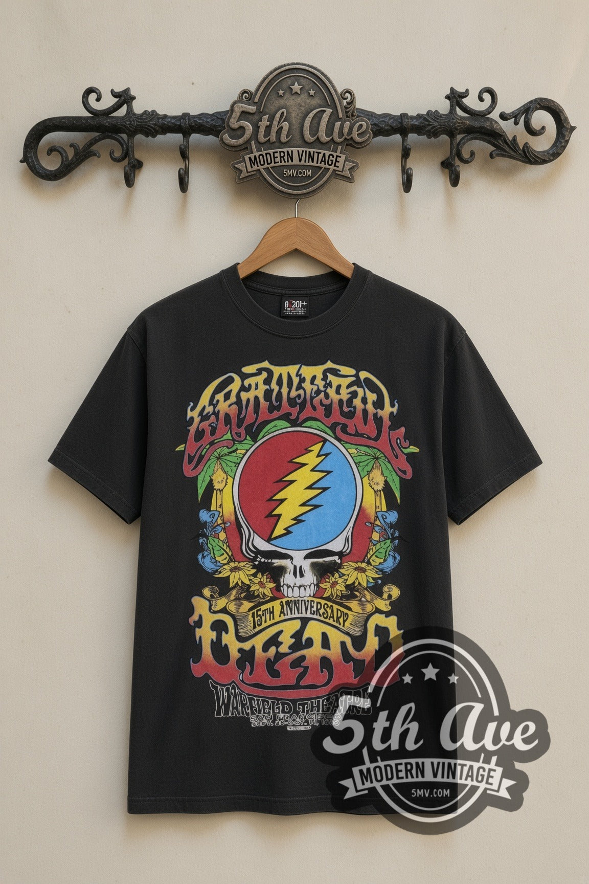Grateful Dead Steal Your Face & Rose Skeleton Warfield vintage band t-shirt in black, front view on a display rack