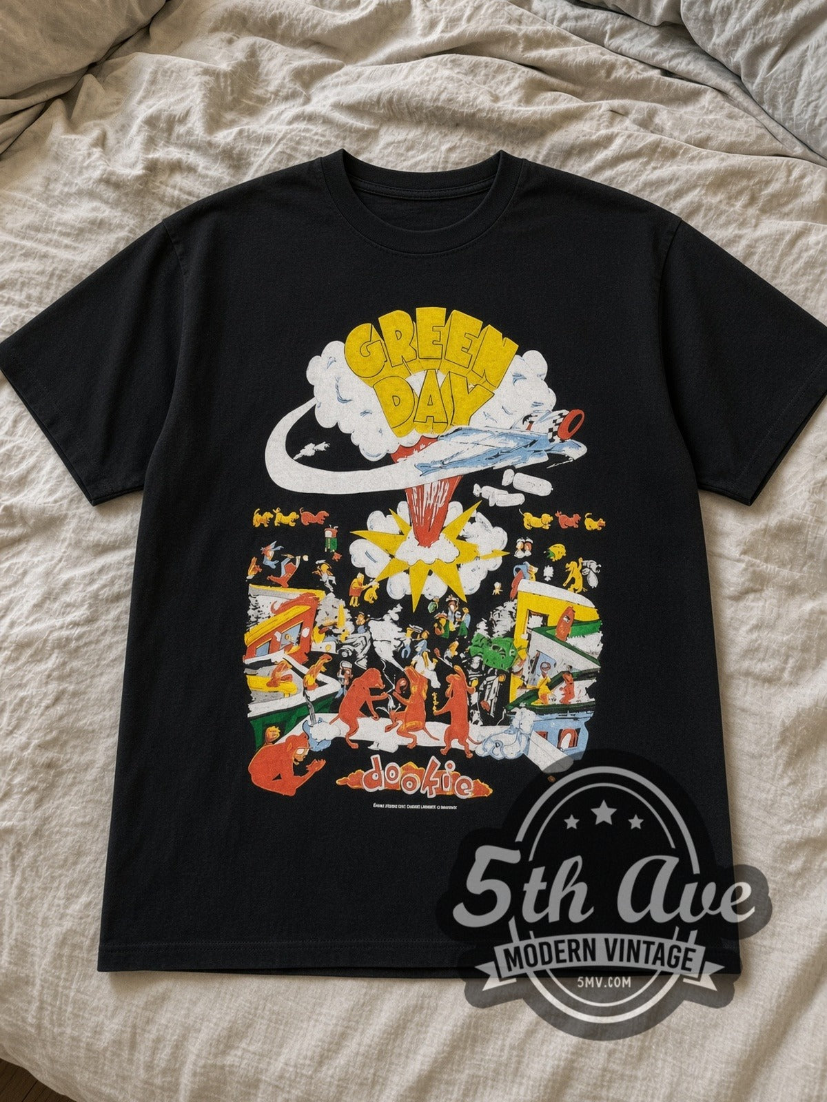 Black Green Day Dookie Tour 1994 Vintage Band T-Shirt laid flat on a linen bed