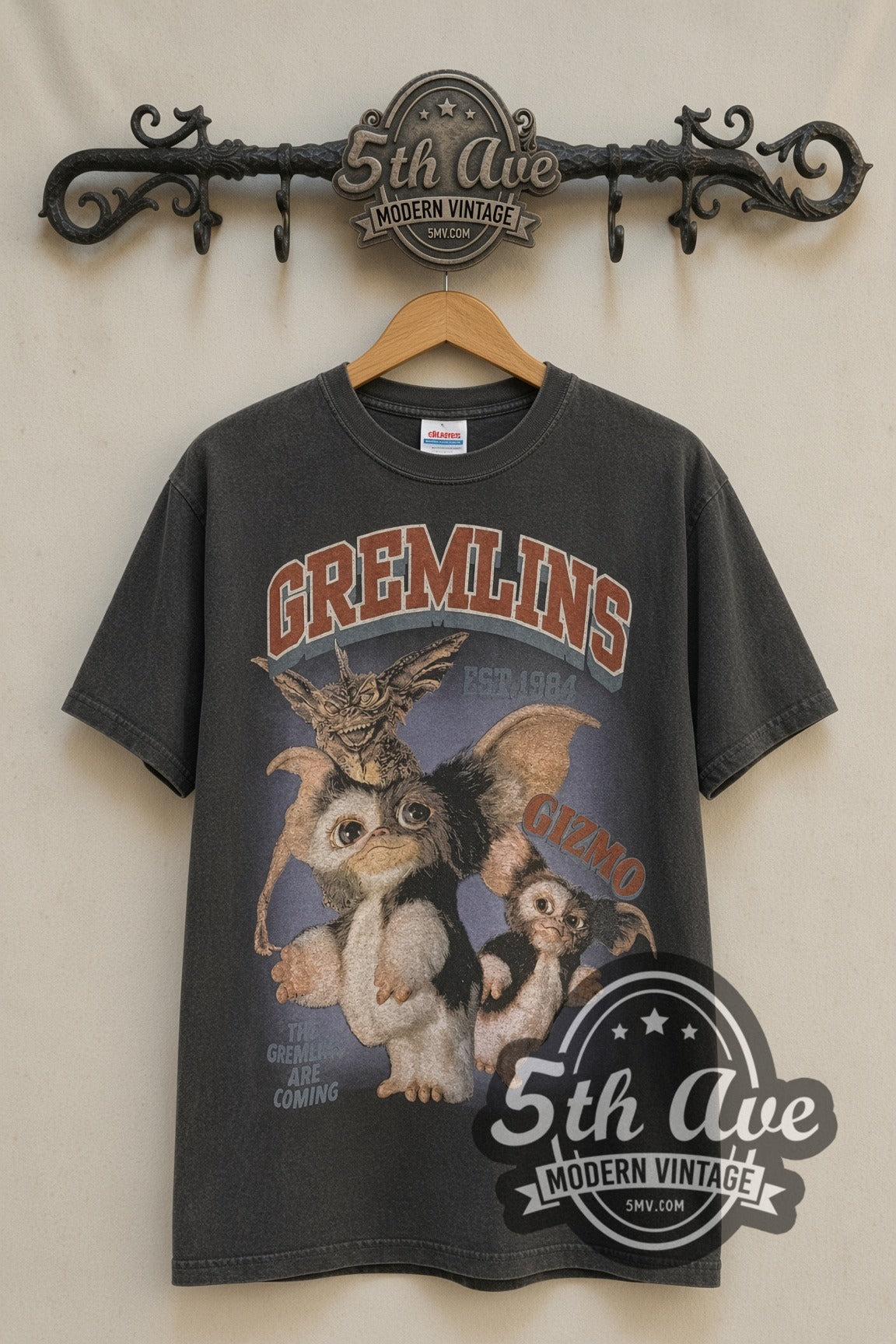 Gremlins Est. 1984 Gizmo & Stripe / Gizmo in a Box vintage movie tee front on 5th Ave iron rack