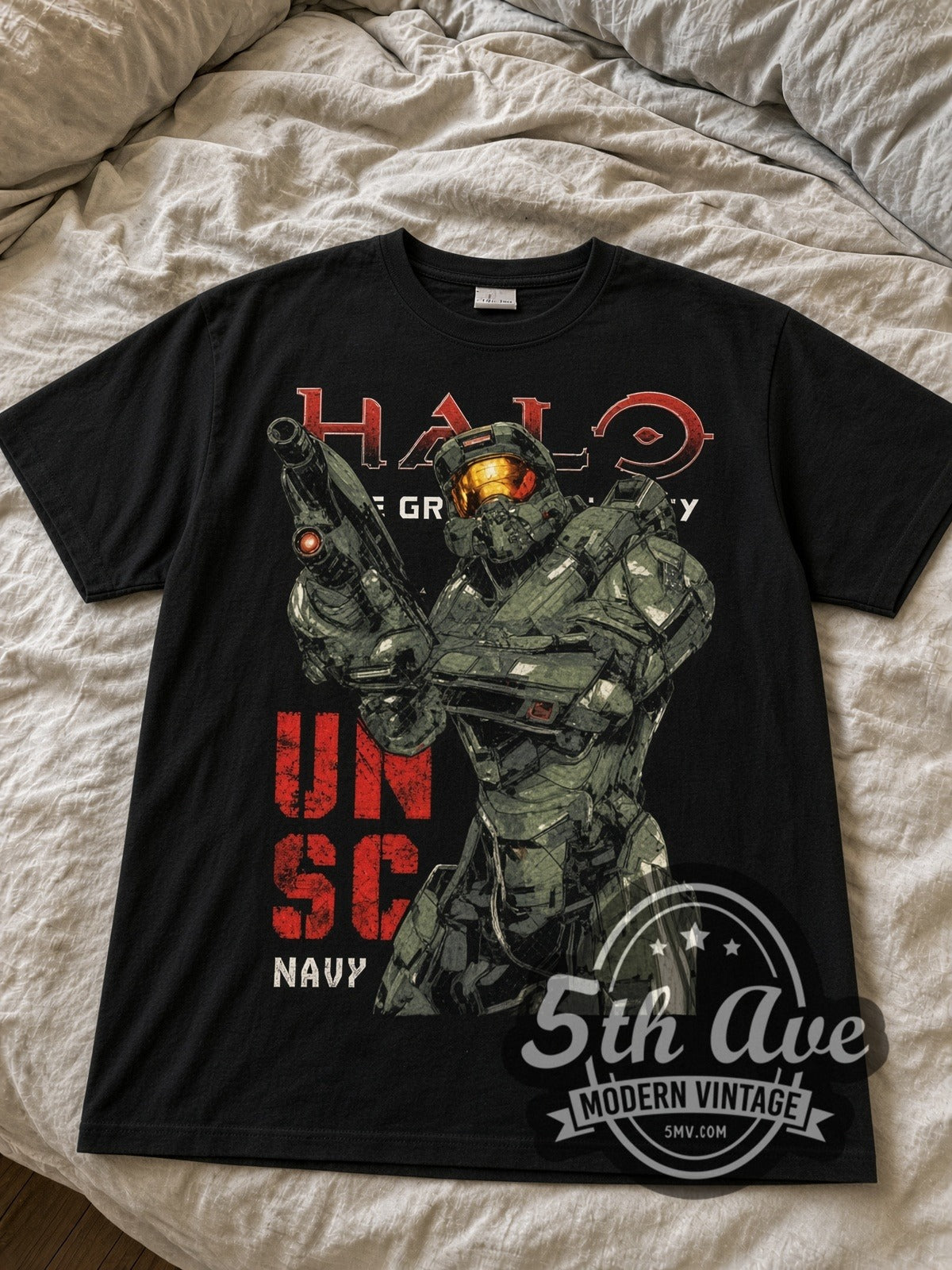 Halo Master Chief UNSC black graphic tee laid flat on linen bed