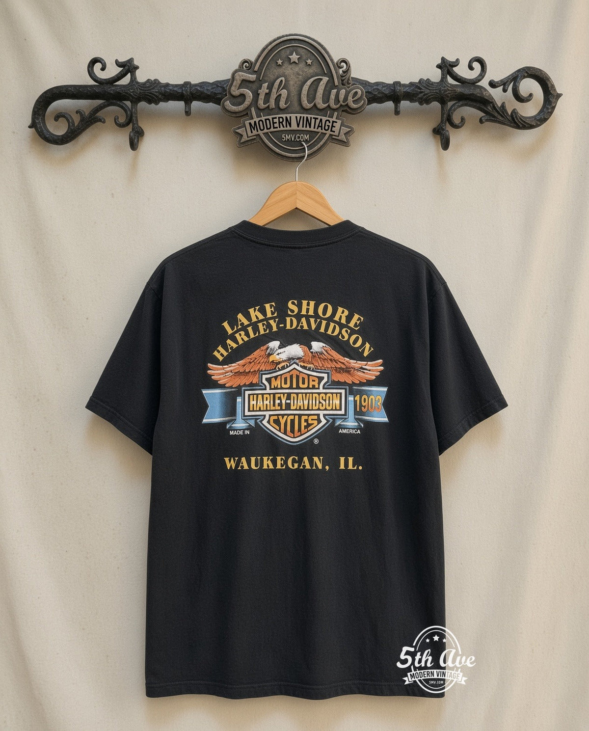 Harley-Davidson Bad to the Bone graphic tee in black, back view on a display rack