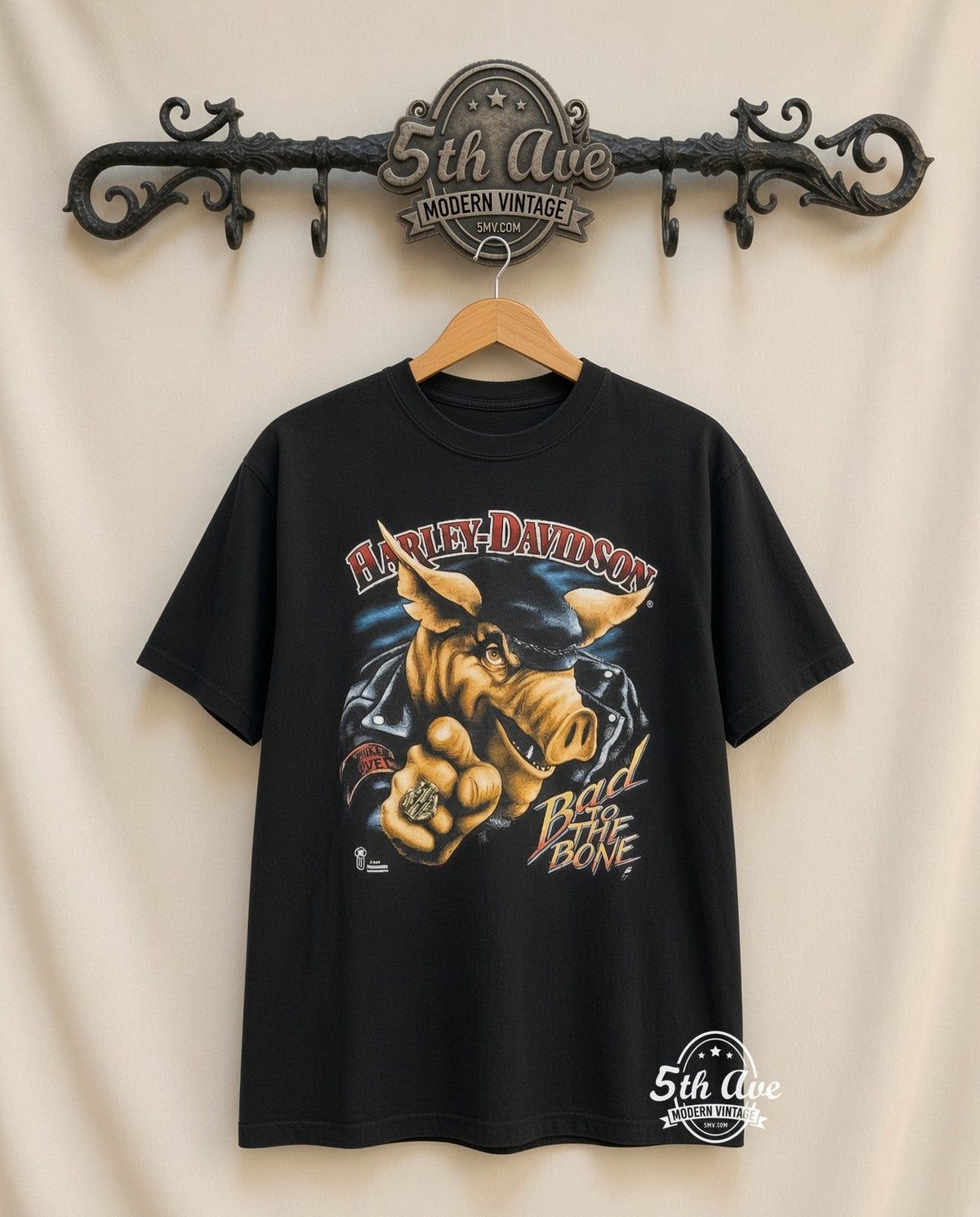 Harley-Davidson Bad to the Bone graphic tee in black, front view on a display rack