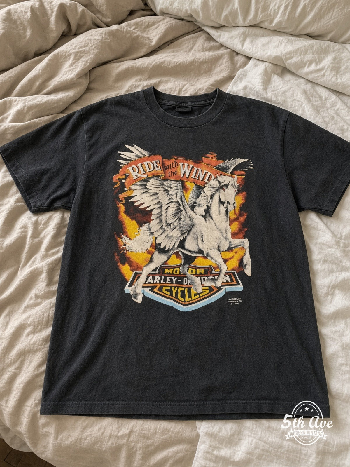 Harley-Davidson vintage t-shirt laid on bed