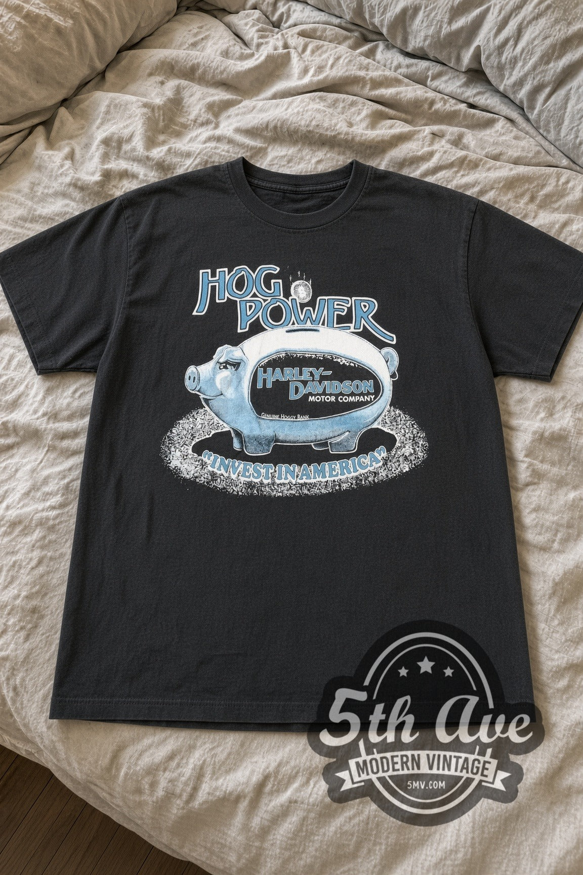 Harley-Davidson Hog Power Invest in America Piggy Bank vintage graphic tee laid flat on bed
