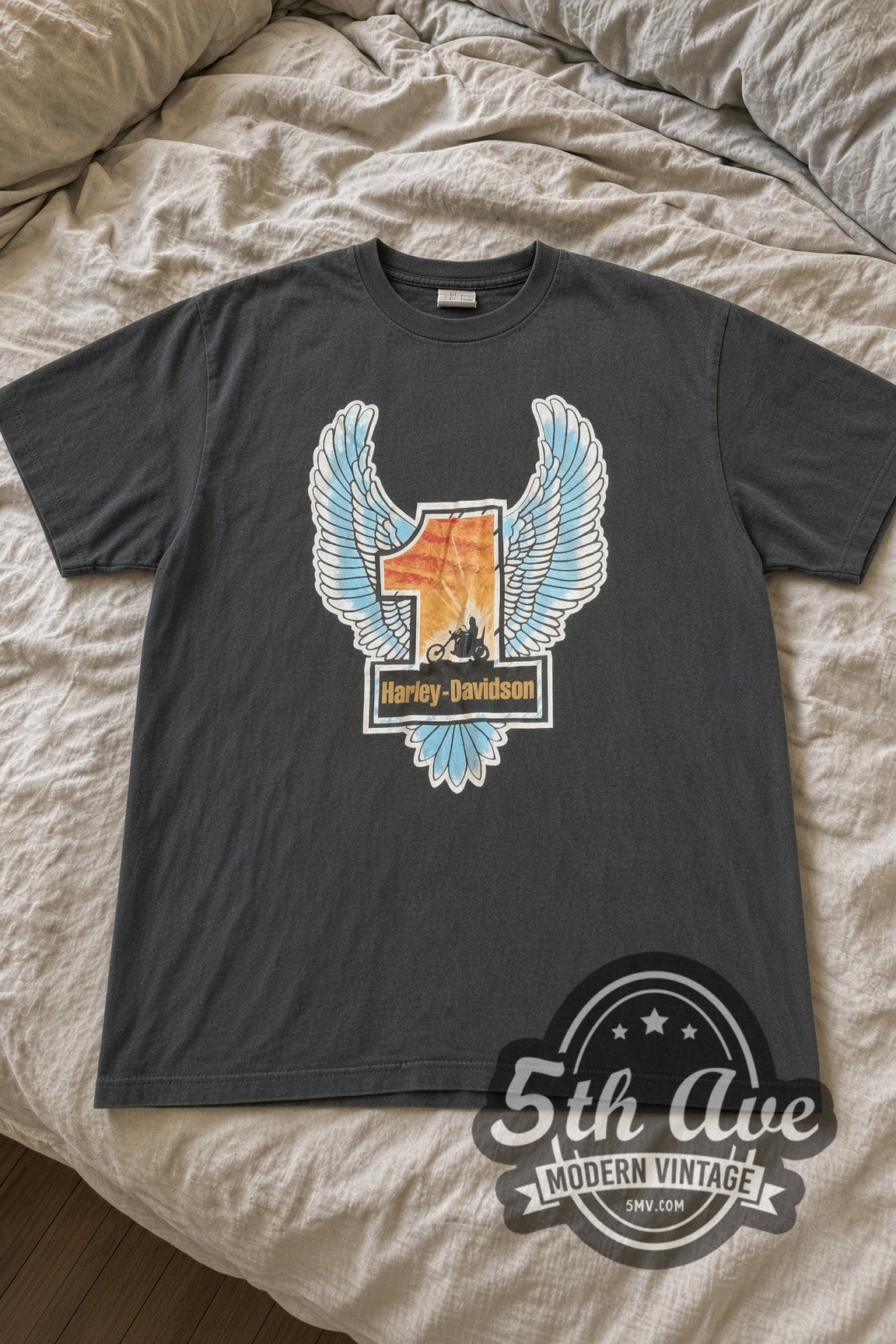 Harley-Davidson Sunset #1 Wings Heritage Back vintage graphic tee laid flat on bed