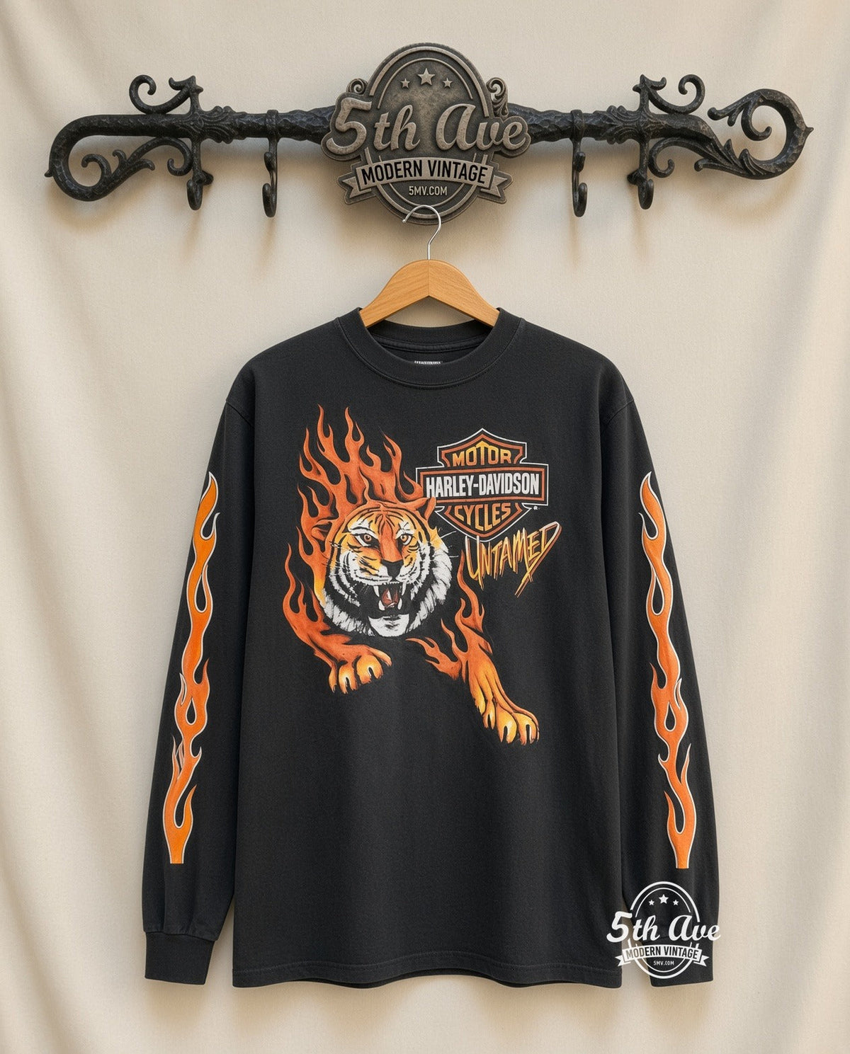 Harley Davidson 'Untamed' graphic tee in black, front view on a display rack