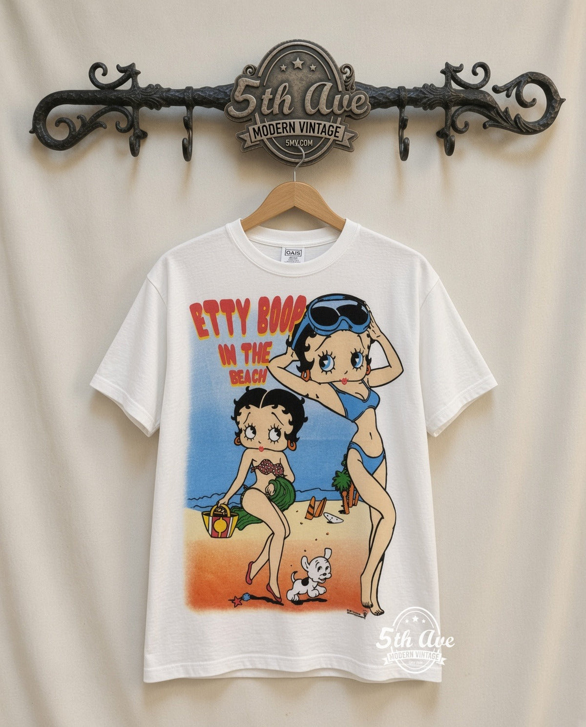 Betty Boop 'Sunbathe' Tee: Retro-Style Streetwear Essential with a 30-Day Guarantee vintage tee on 5th Ave cream rack — front