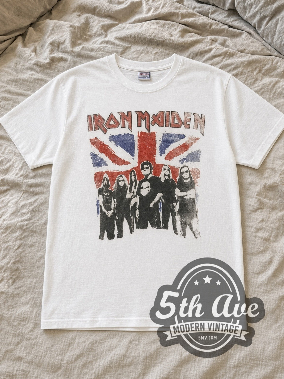 White Iron Maiden Union Jack Band Photo Vintage Band T-Shirt laid flat on a linen bed