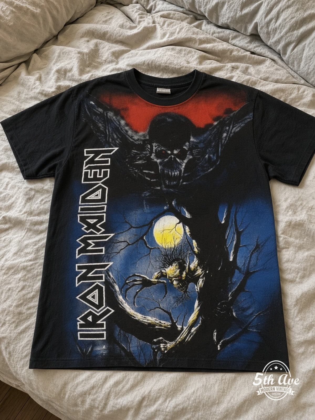 Iron Maiden Fear of the Dark Vertical Wordmark all over print vintage tee laid on bed