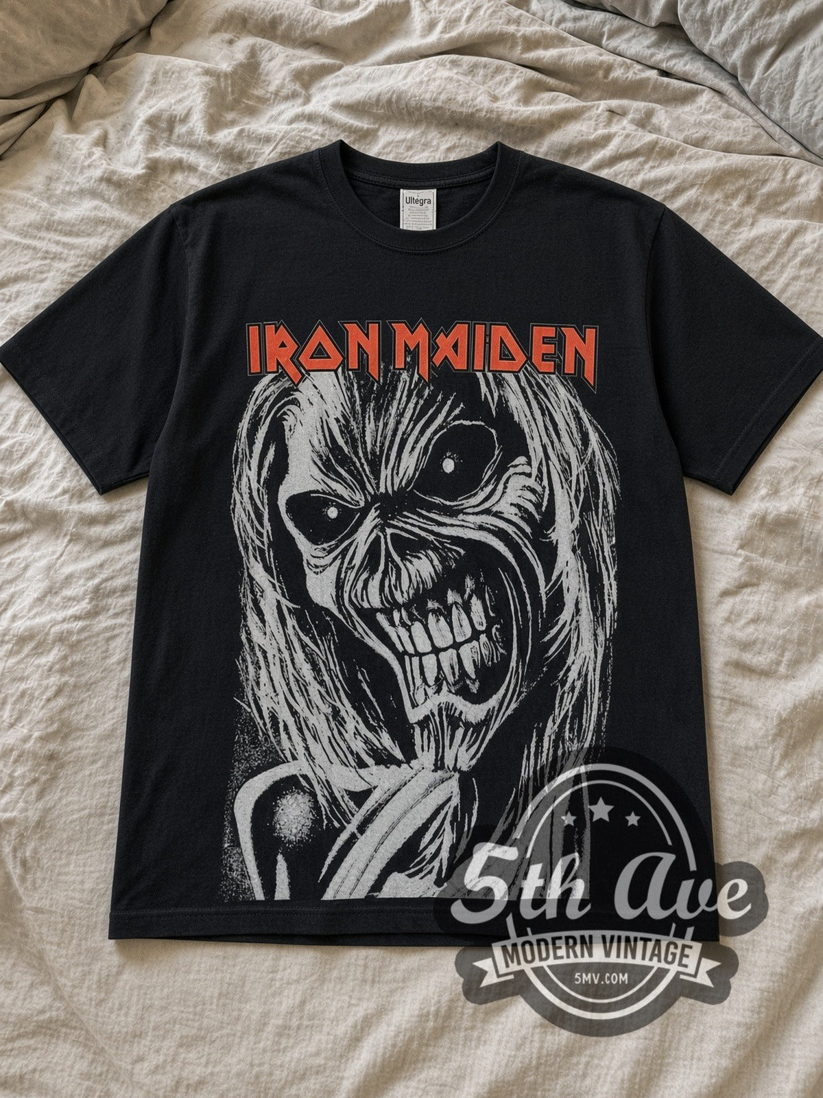 Black Iron Maiden Killers Monochrome Eddie Block Vintage Band T-Shirt laid flat on a linen bed