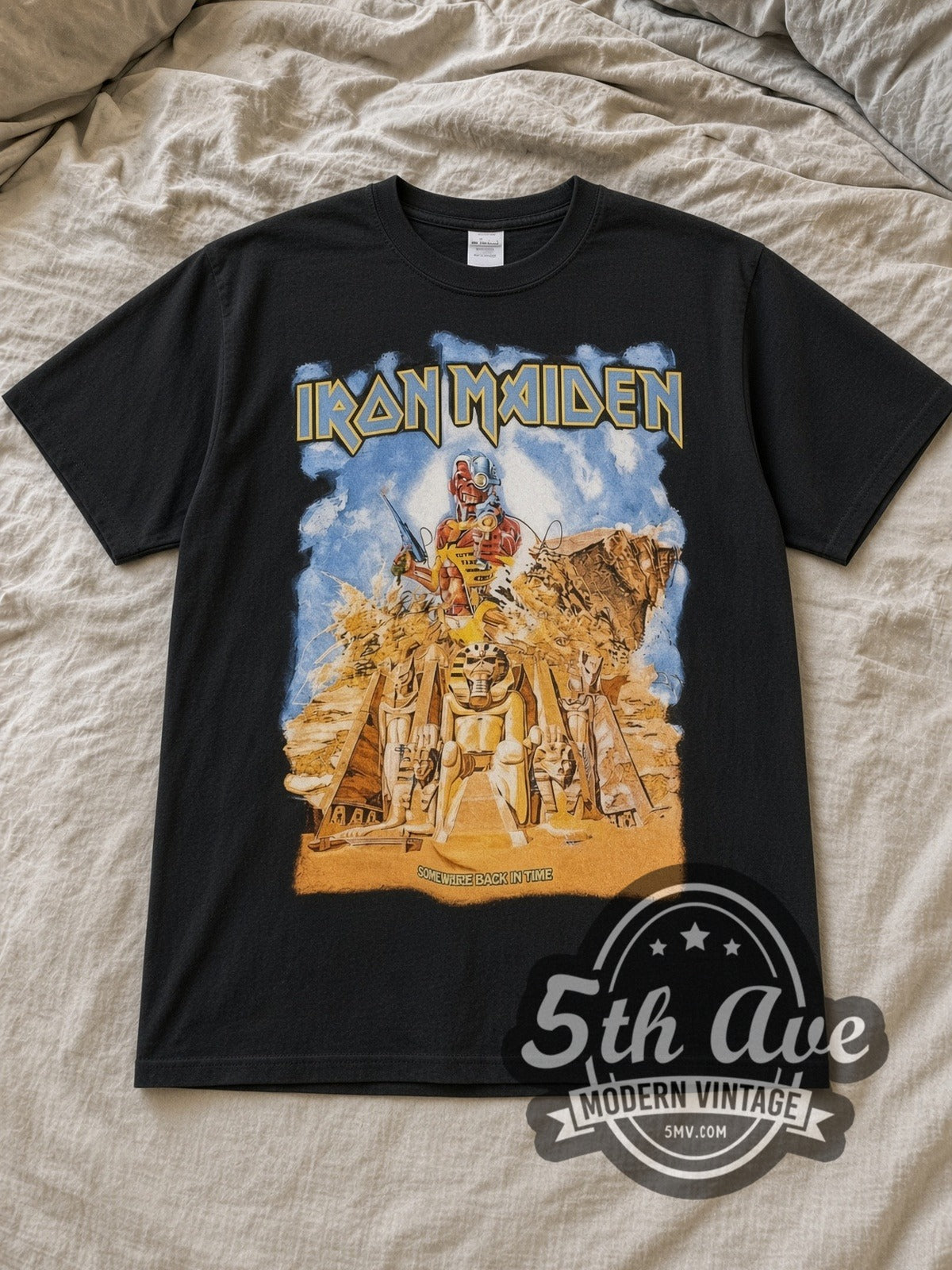 Black Iron Maiden Somewhere Back in Time Vintage Band T-Shirt laid flat on a linen bed
