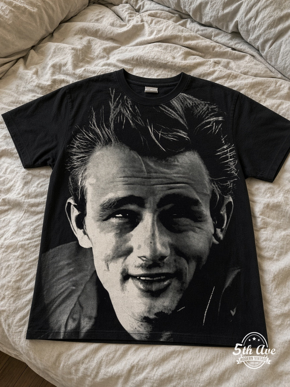 James Dean Smile Portrait all over print vintage tee laid on bed