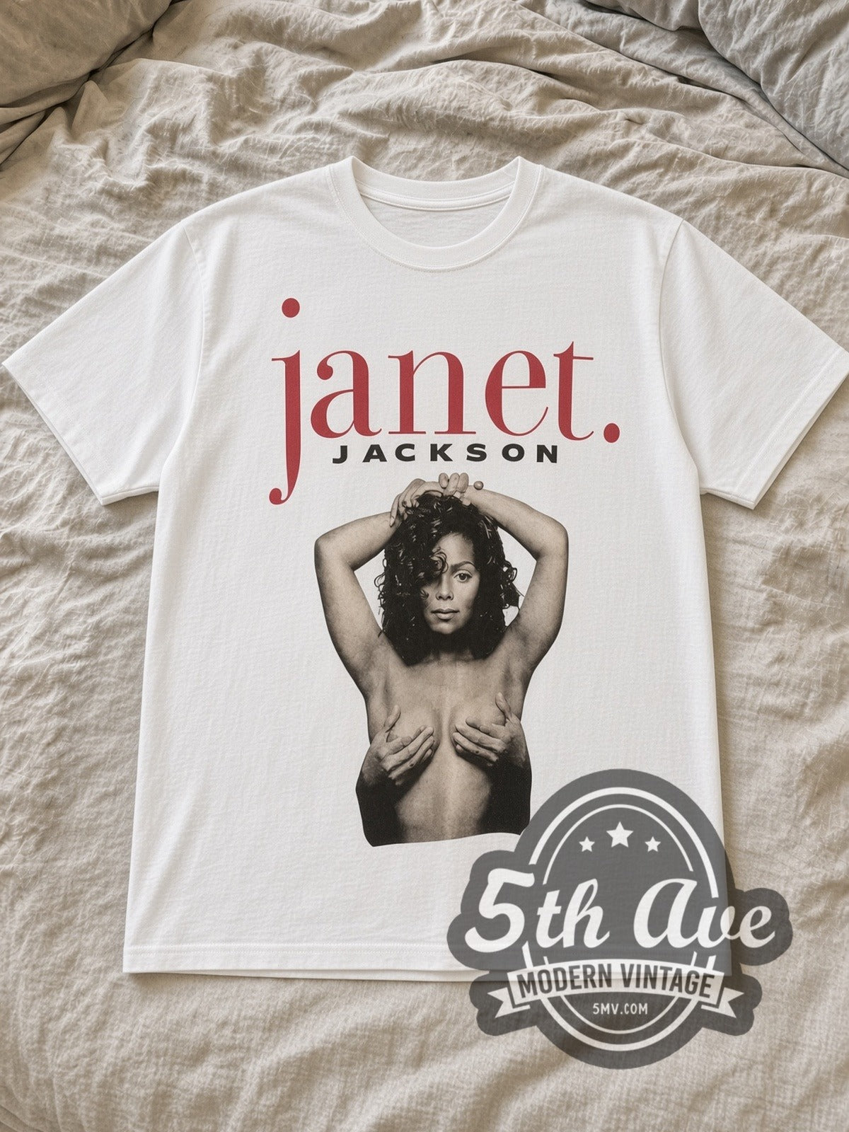 White Janet Jackson Palau Sant Jordi Barcelona Vintage Band T-Shirt laid flat on a linen bed