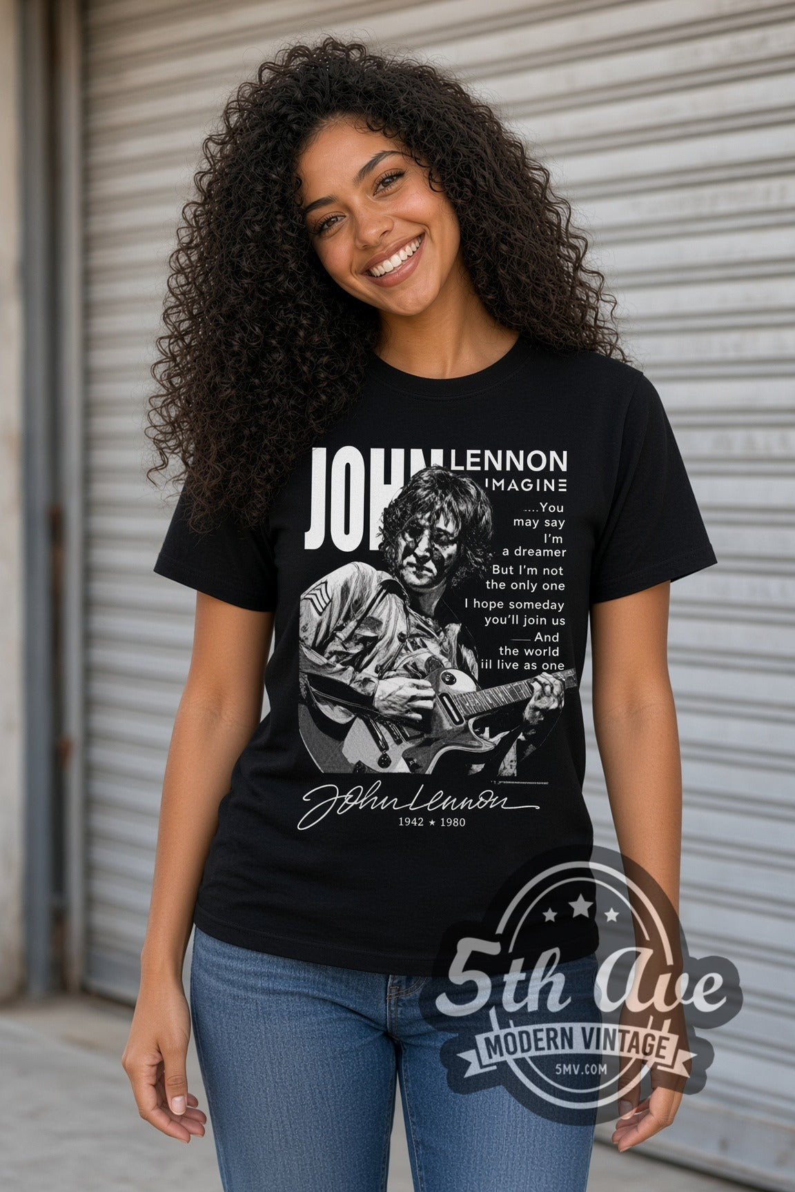 Woman wearing John Lennon Imagine Lyrics Portrait double stitched black graphic tee