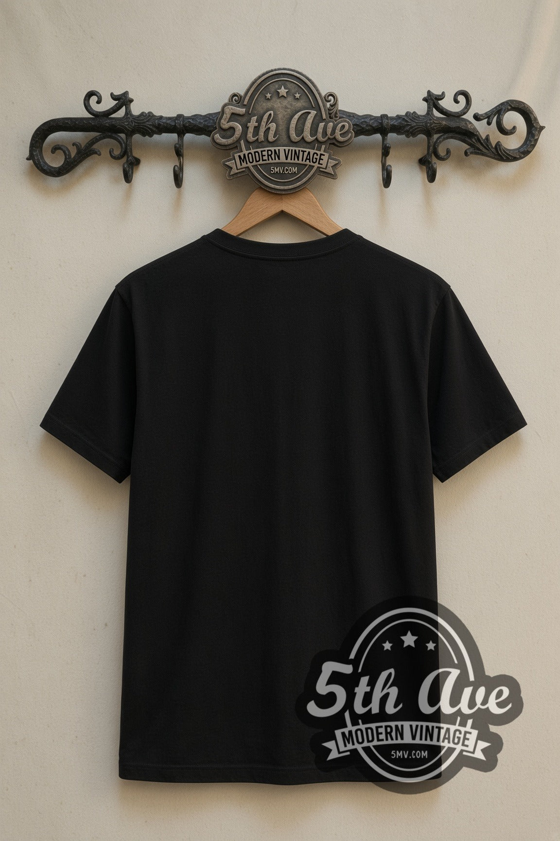 Plain black back of John Lennon War Is Over Portrait double stitched tee on rack