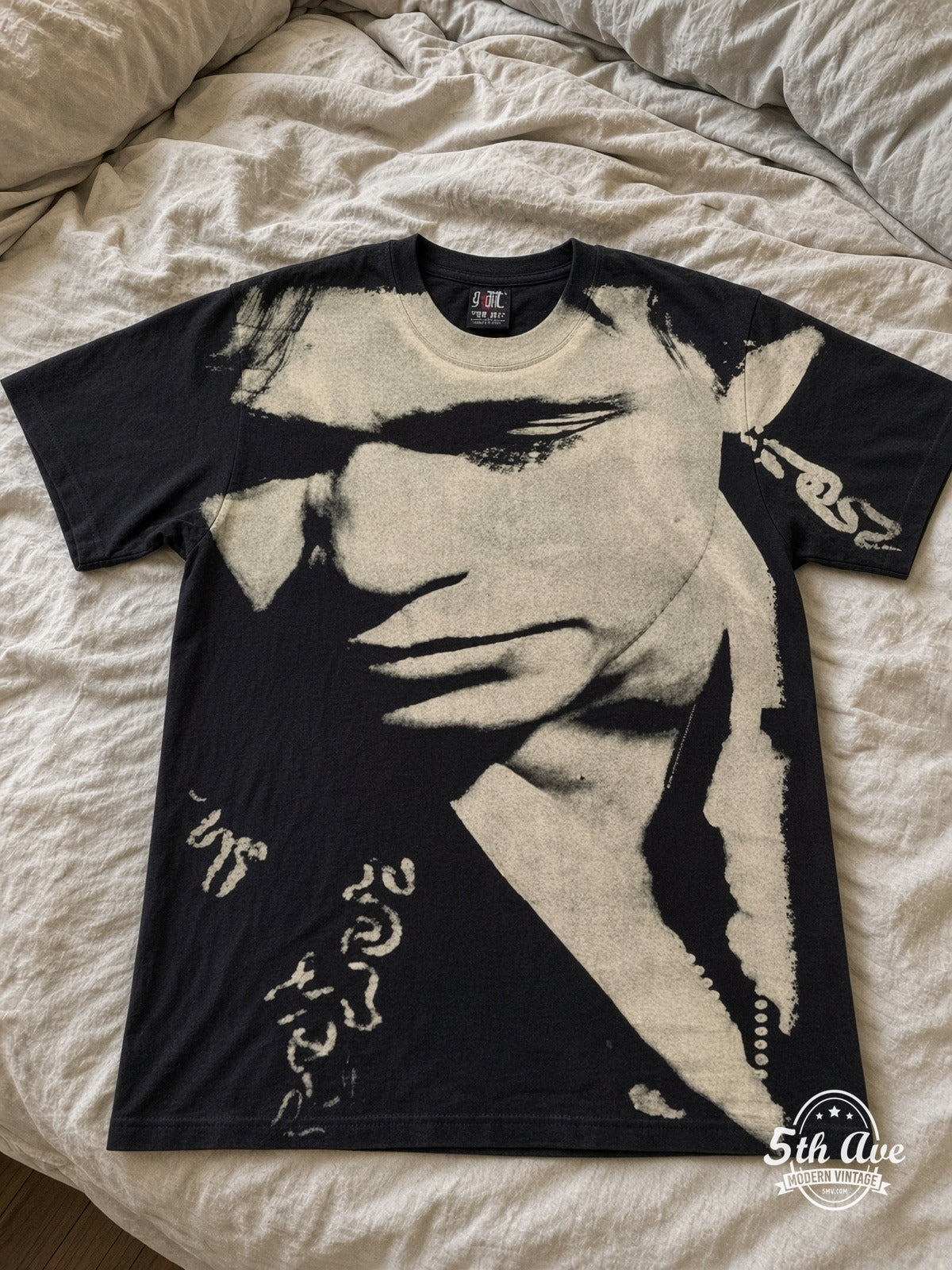 John Mellencamp Whenever We Wanted Tour 1992 all over print vintage tee laid on bed