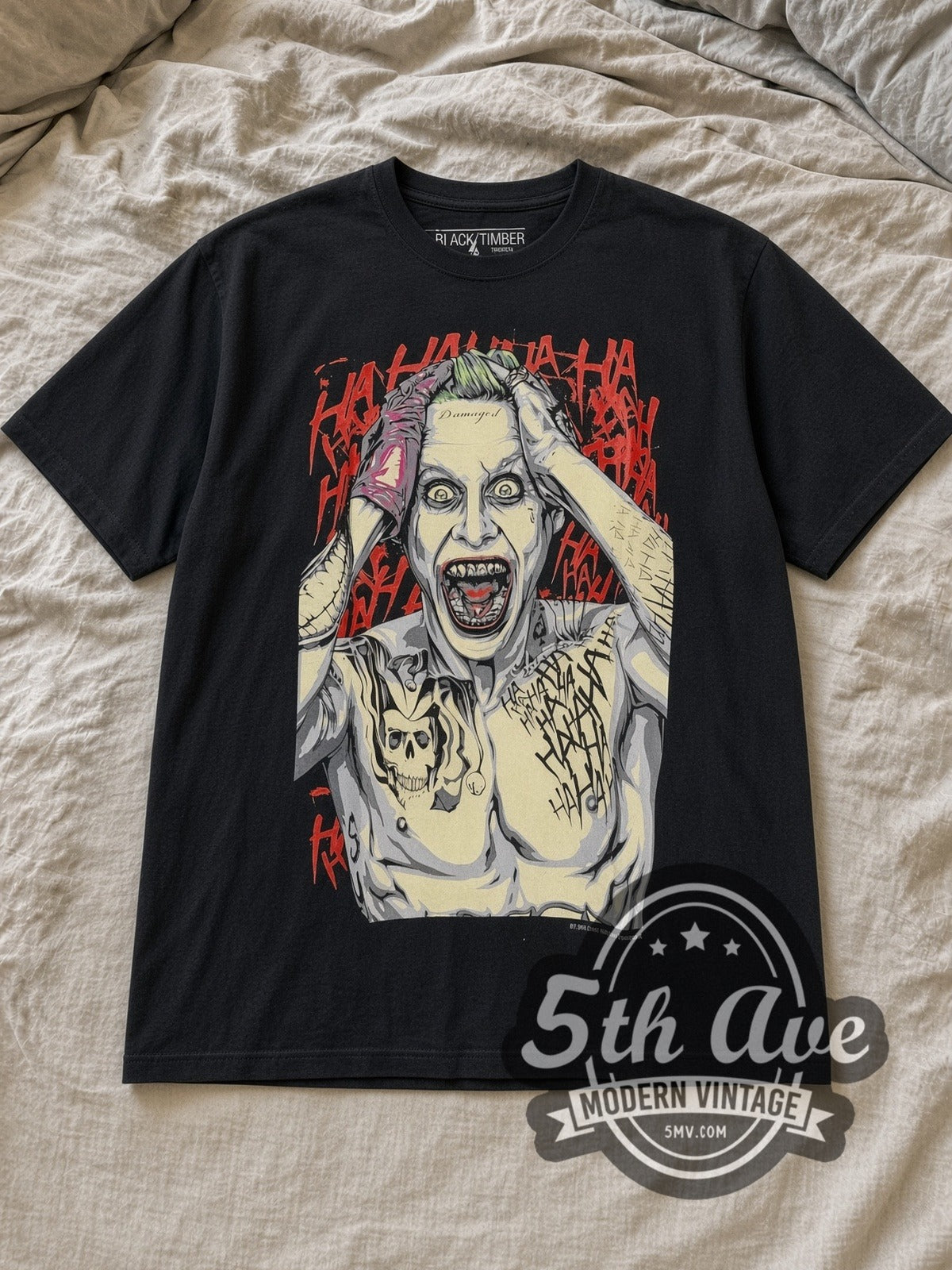 Black Joker Suicide Squad Jared Leto Vintage Movie T-Shirt laid flat on a linen bed