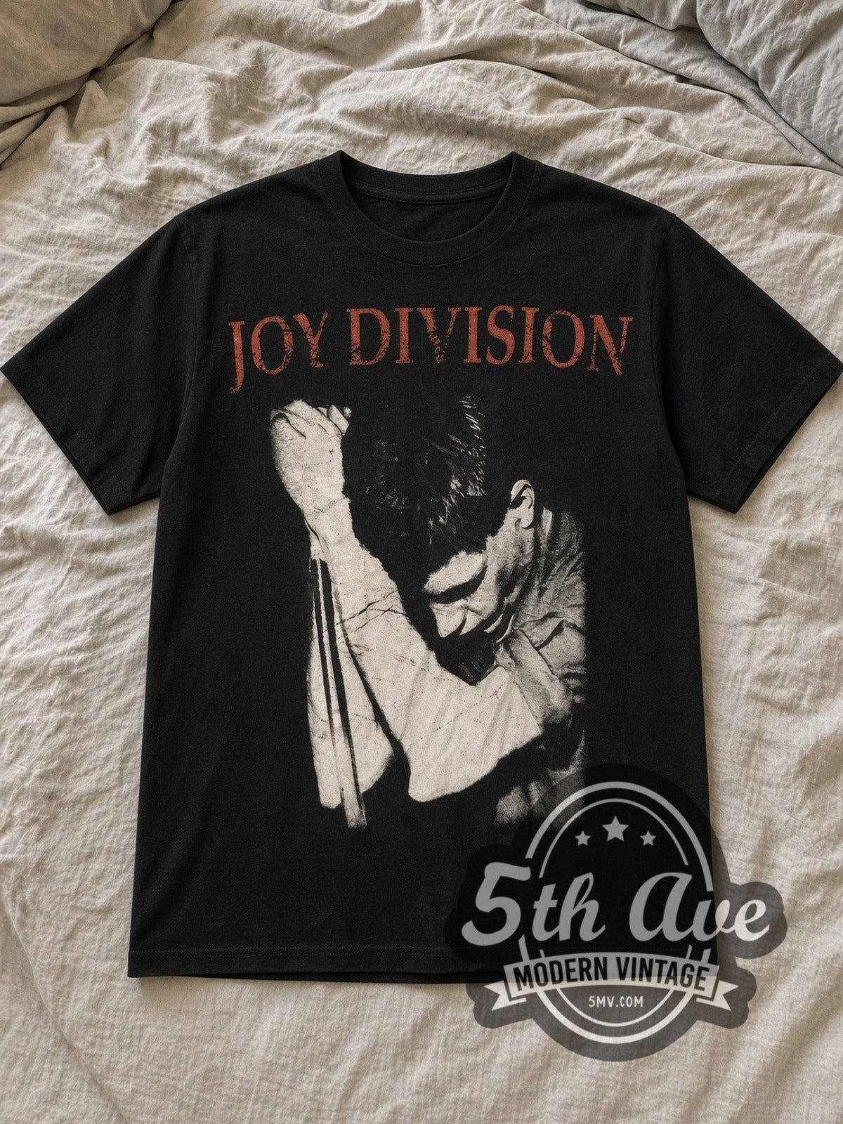Black Joy Division Singer Microphone Portrait Vintage Band T-Shirt laid flat on a linen bed